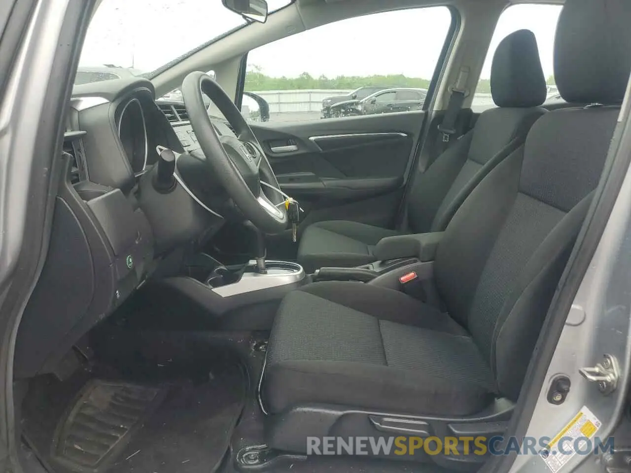 7 fotografías del automóvil dañado 3HGGK5H47KM731698 HONDA FIT 2019