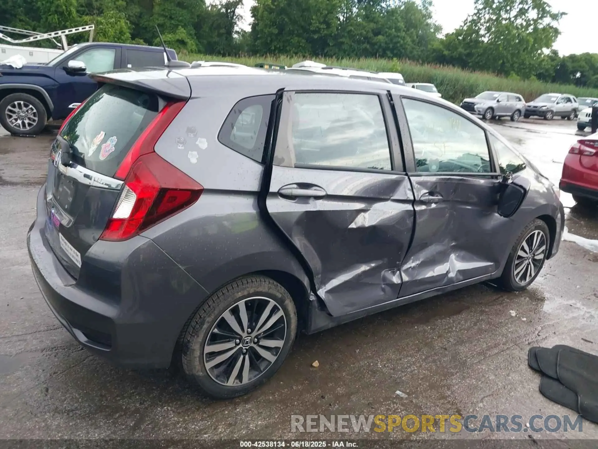 6 fotografías del automóvil dañado 3HGGK5H85KM748308 HONDA FIT 2019