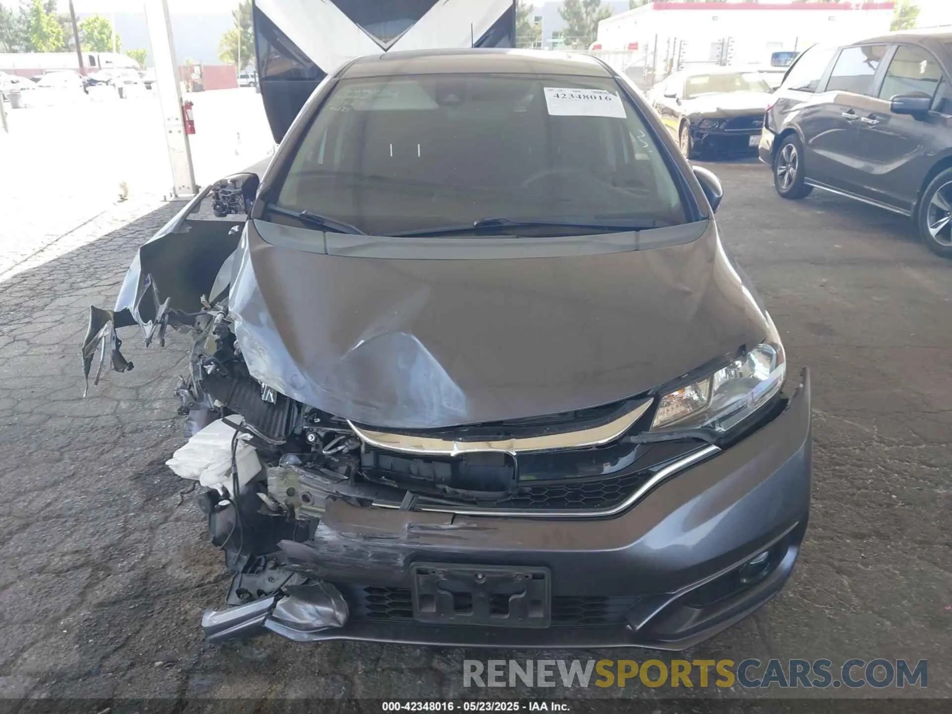 12 fotografías del automóvil dañado 3HGGK5H88KM719594 HONDA FIT 2019