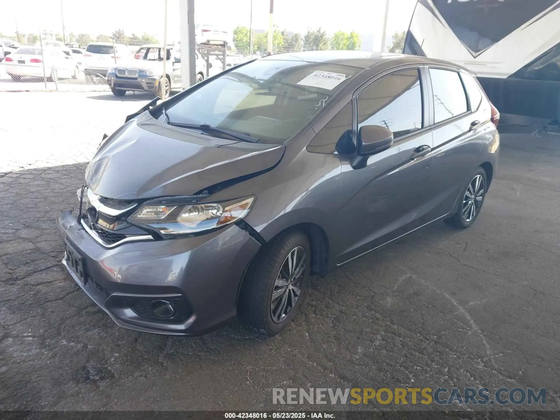 2 fotografías del automóvil dañado 3HGGK5H88KM719594 HONDA FIT 2019