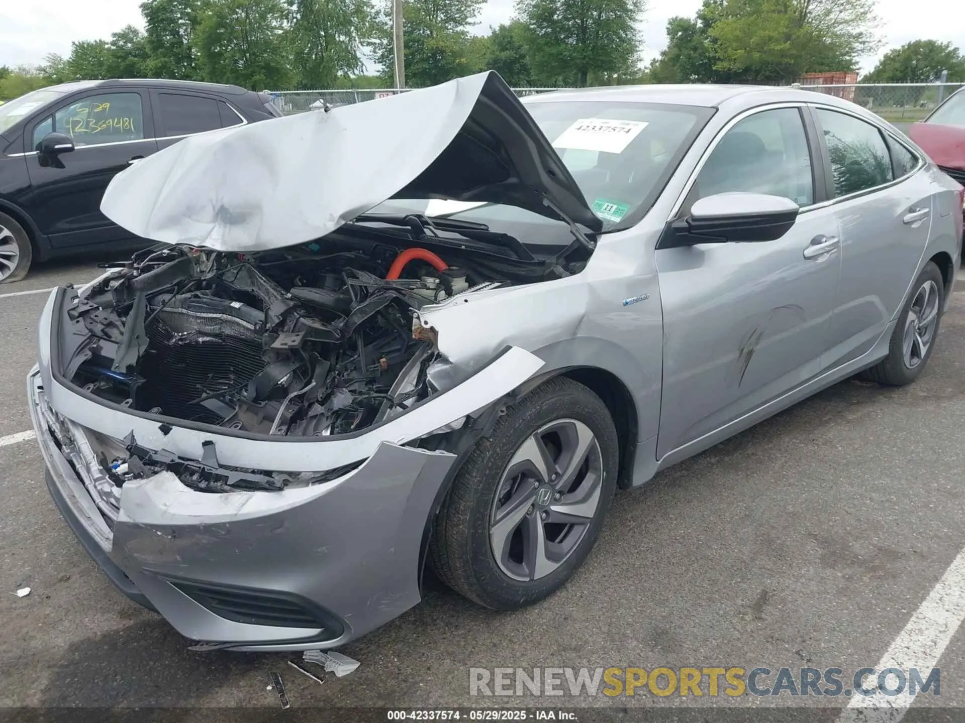 2 fotografías del automóvil dañado 19XZE4F14KE009861 HONDA INSIGHT 2019
