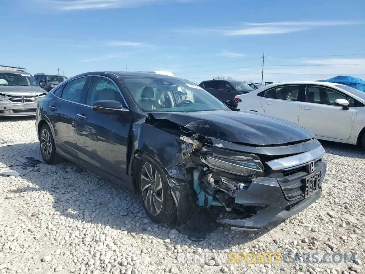 4 fotografías del automóvil dañado 19XZE4F93KE022378 HONDA INSIGHT 2019