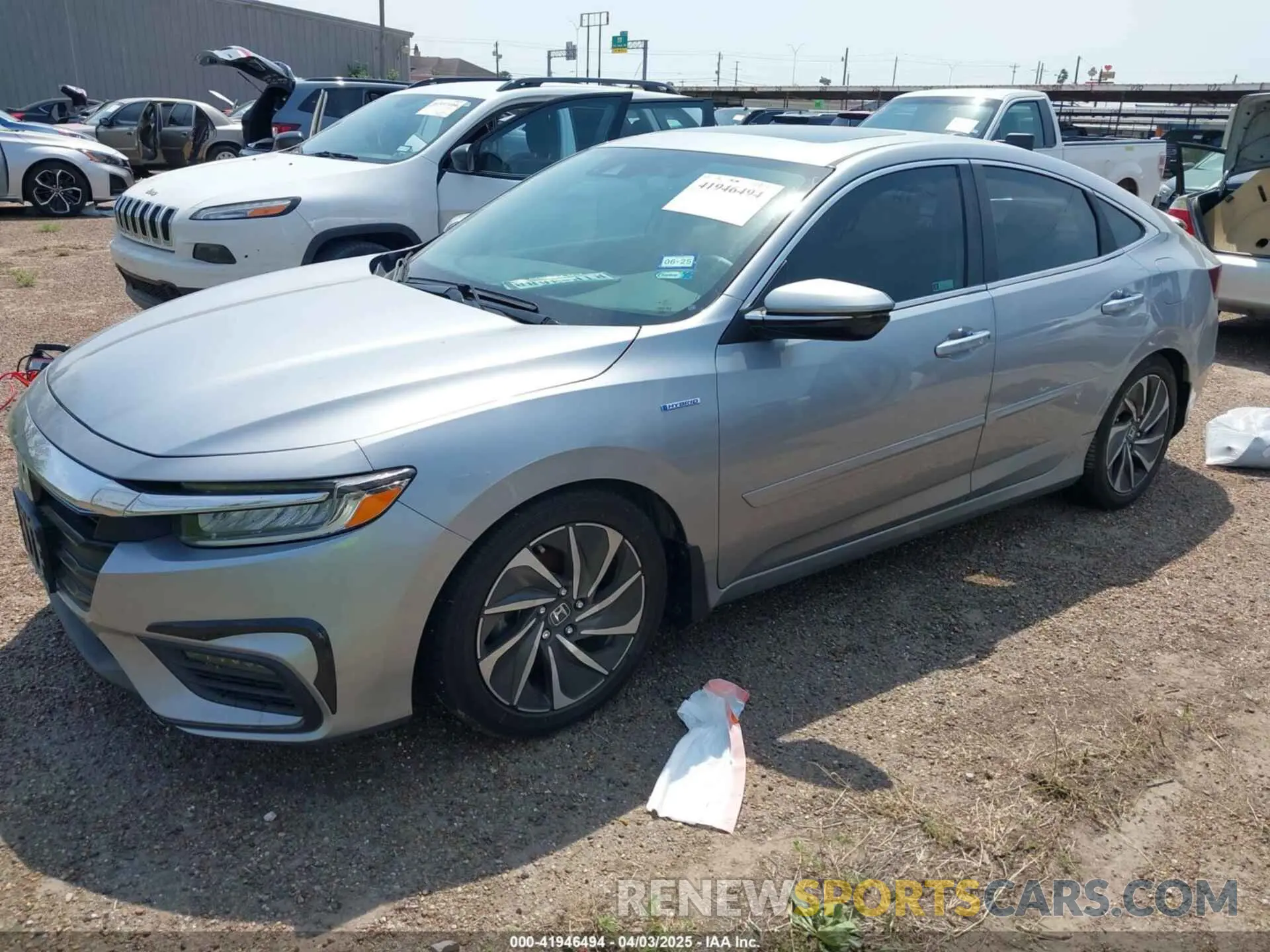 2 fotografías del automóvil dañado 19XZE4F96KE007485 HONDA INSIGHT 2019