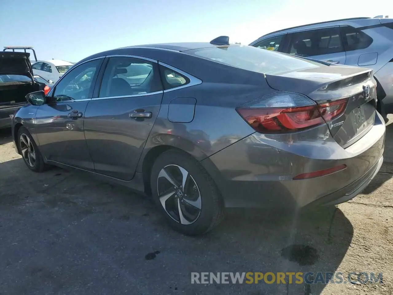2 fotografías del automóvil dañado 19XZE4F50ME011306 HONDA INSIGHT 2021