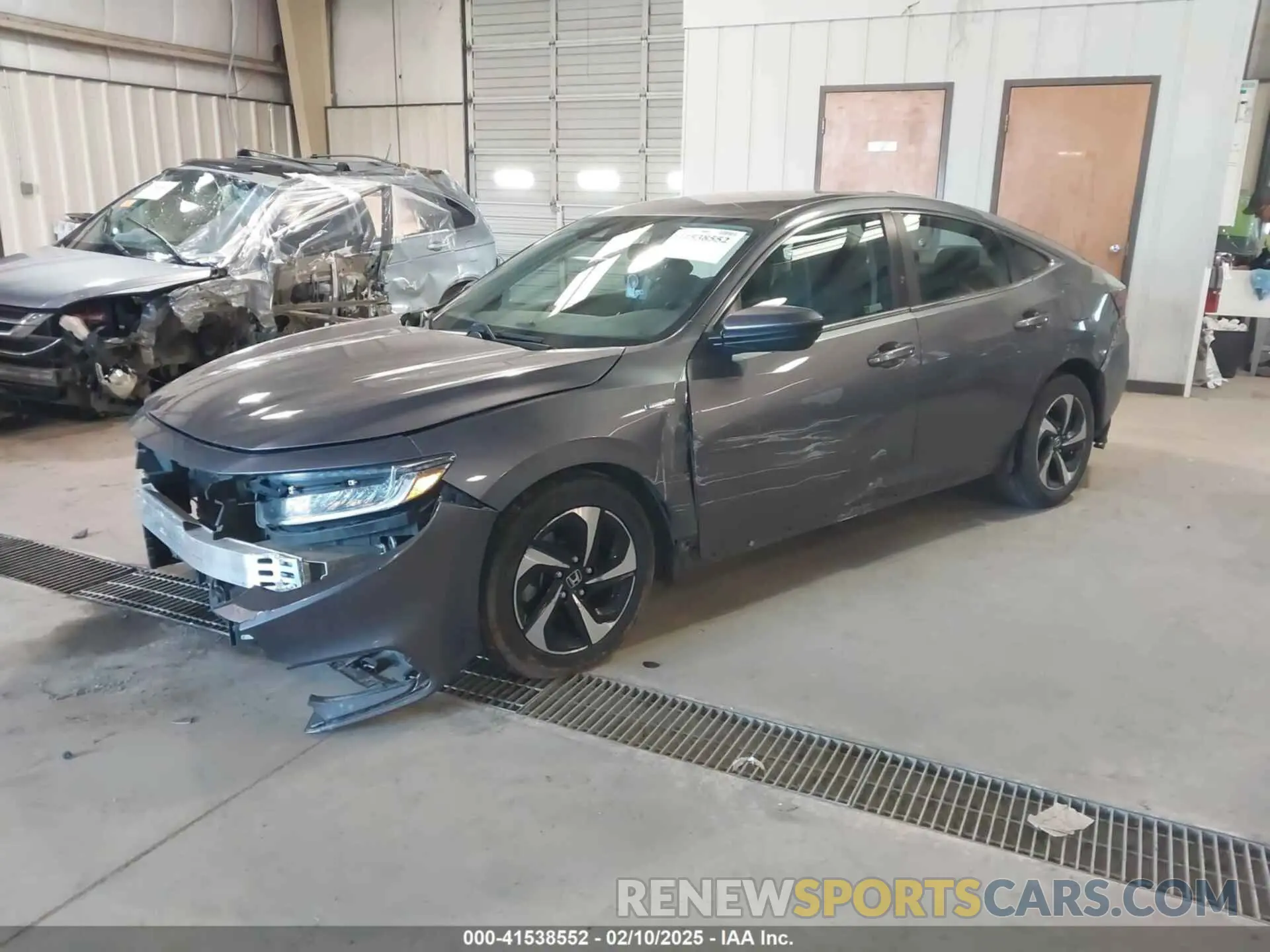 2 fotografías del automóvil dañado 19XZE4F53ME010943 HONDA INSIGHT 2021