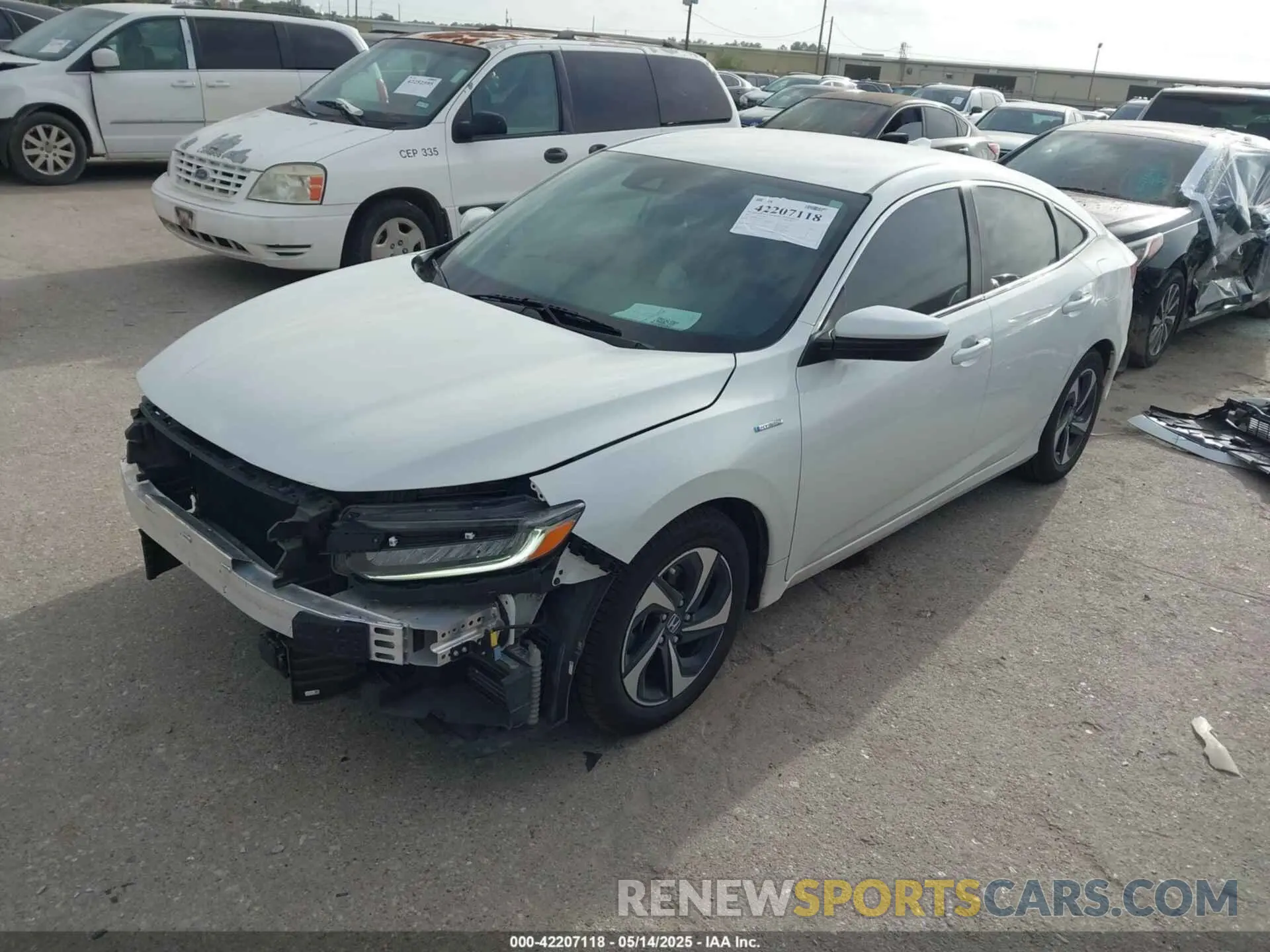 2 fotografías del automóvil dañado 19XZE4F5XME001415 HONDA INSIGHT 2021