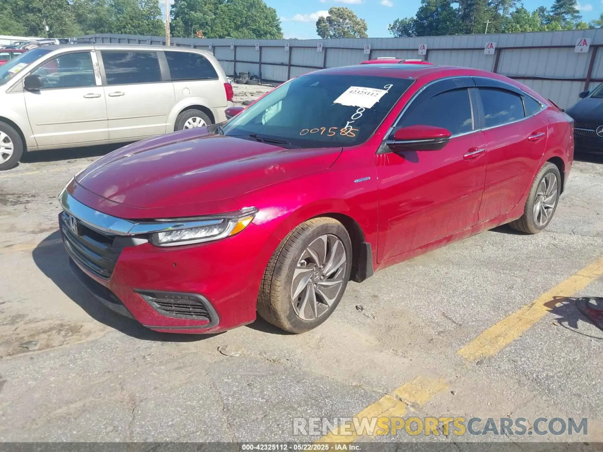 2 fotografías del automóvil dañado 19XZE4F95ME009585 HONDA INSIGHT 2021