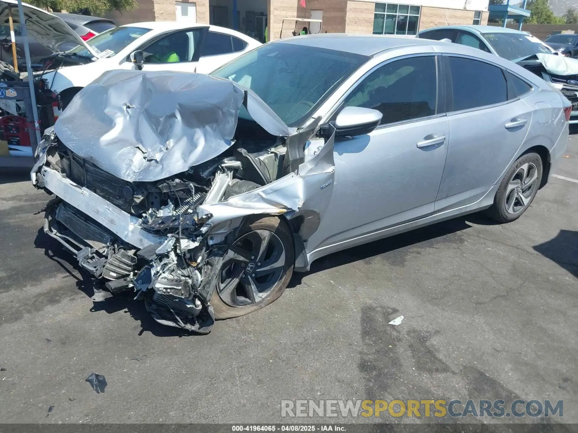 2 fotografías del automóvil dañado 19XZE4F51NE004950 HONDA INSIGHT 2022