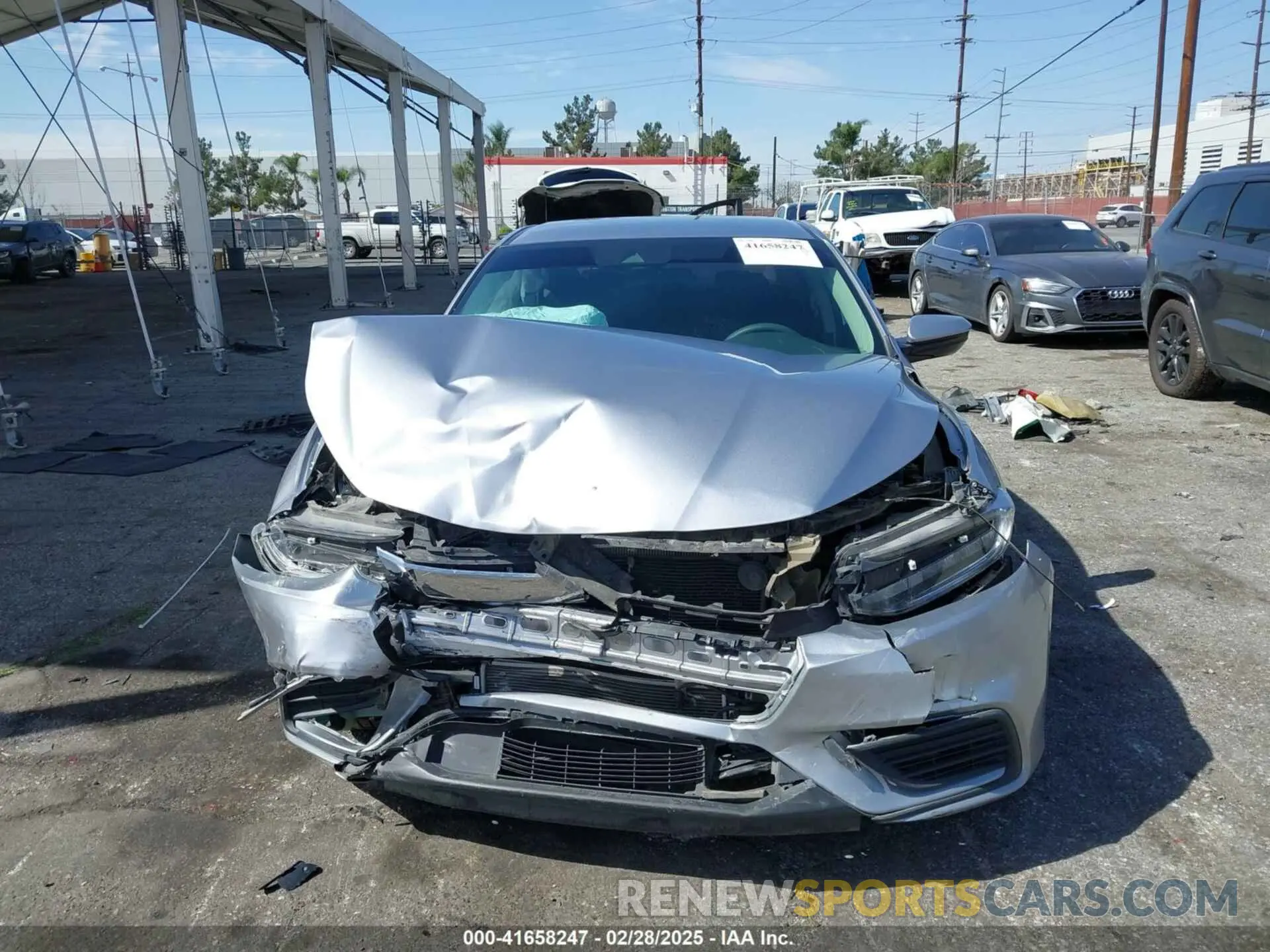 11 fotografías del automóvil dañado 19XZE4F54NE008068 HONDA INSIGHT 2022