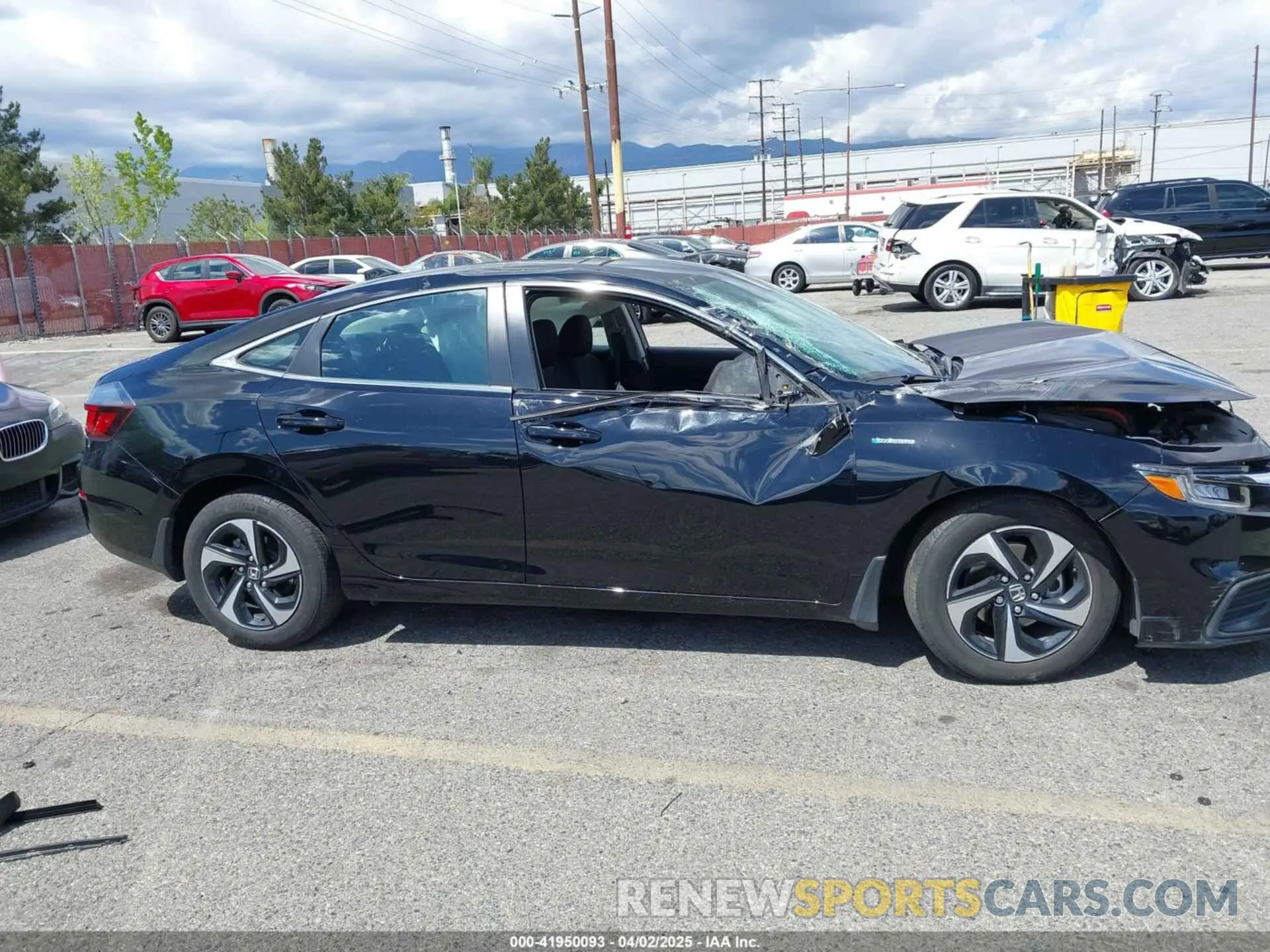 13 fotografías del automóvil dañado 19XZE4F57NE016682 HONDA INSIGHT 2022