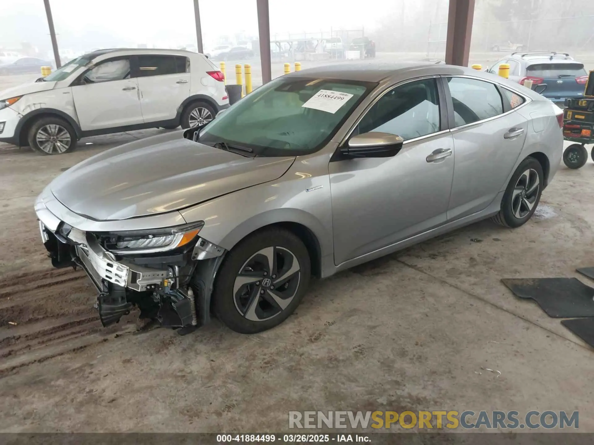 2 fotografías del automóvil dañado 19XZE4F58NE015881 HONDA INSIGHT 2022