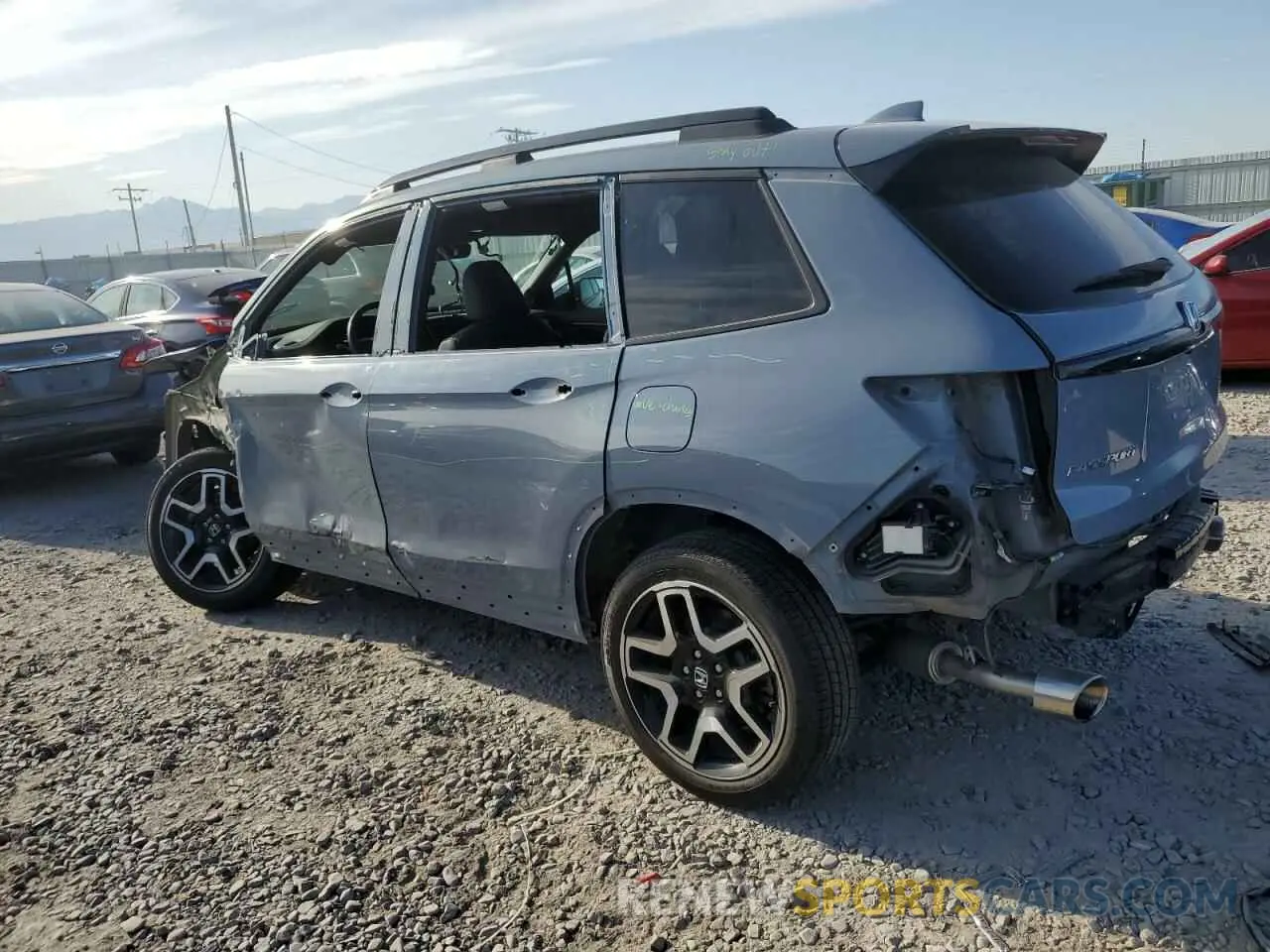 2 fotografías del automóvil dañado 5FNYF8H03NB000345 HONDA PASSPORT 2022