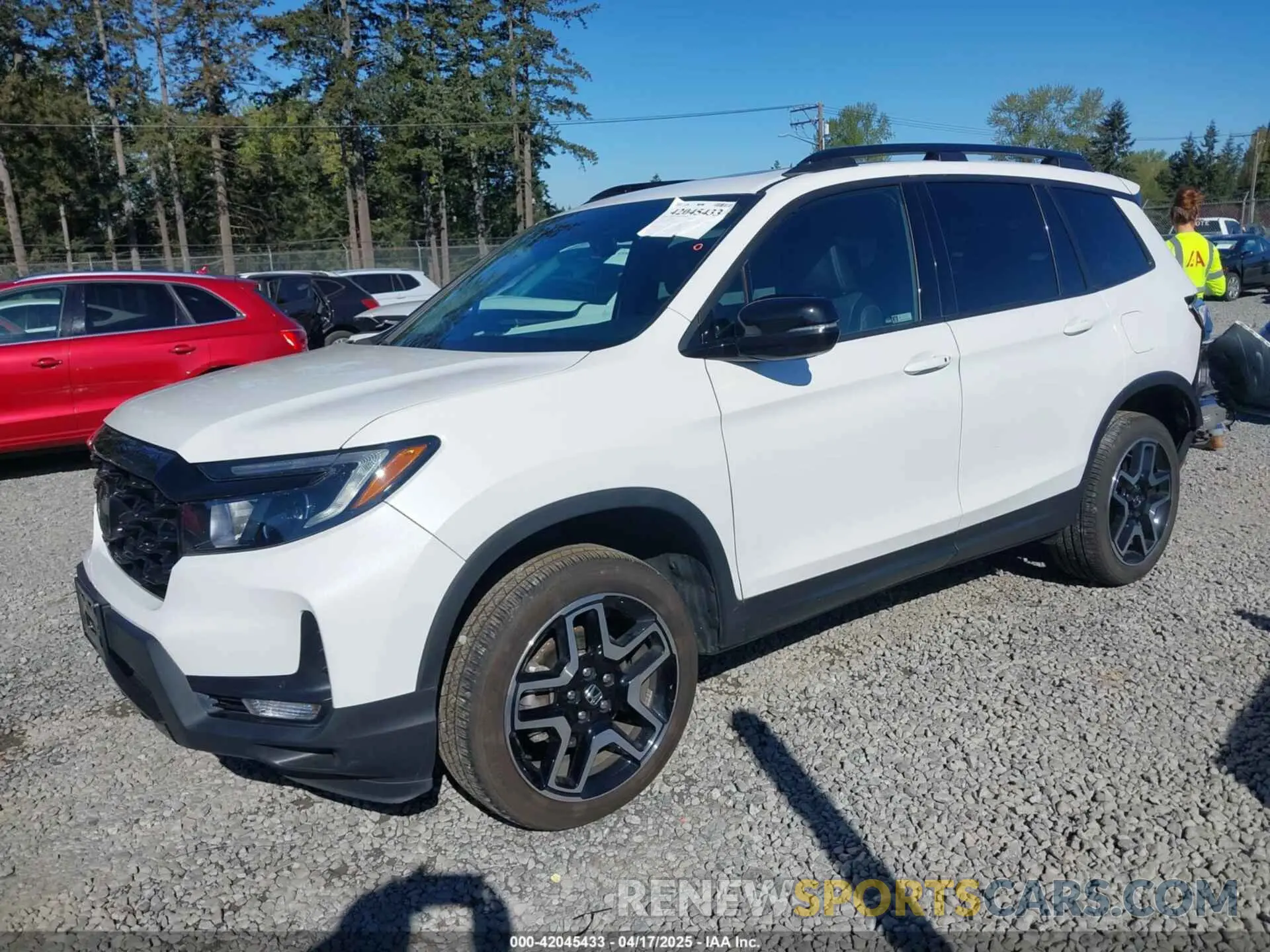 2 fotografías del automóvil dañado 5FNYF8H01PB004087 HONDA PASSPORT 2023