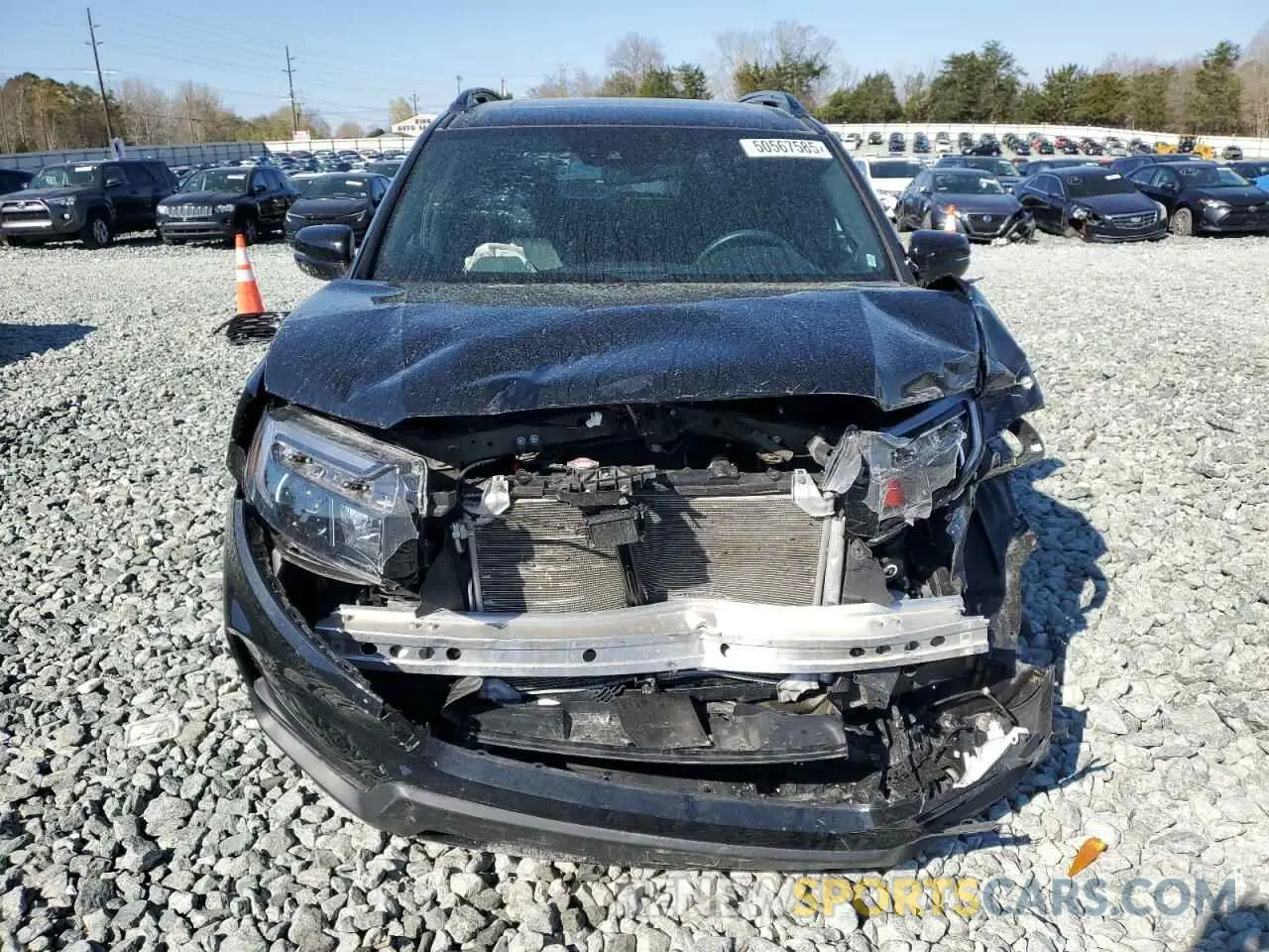 5 fotografías del automóvil dañado 5FNYF8H0XPB034110 HONDA PASSPORT 2023