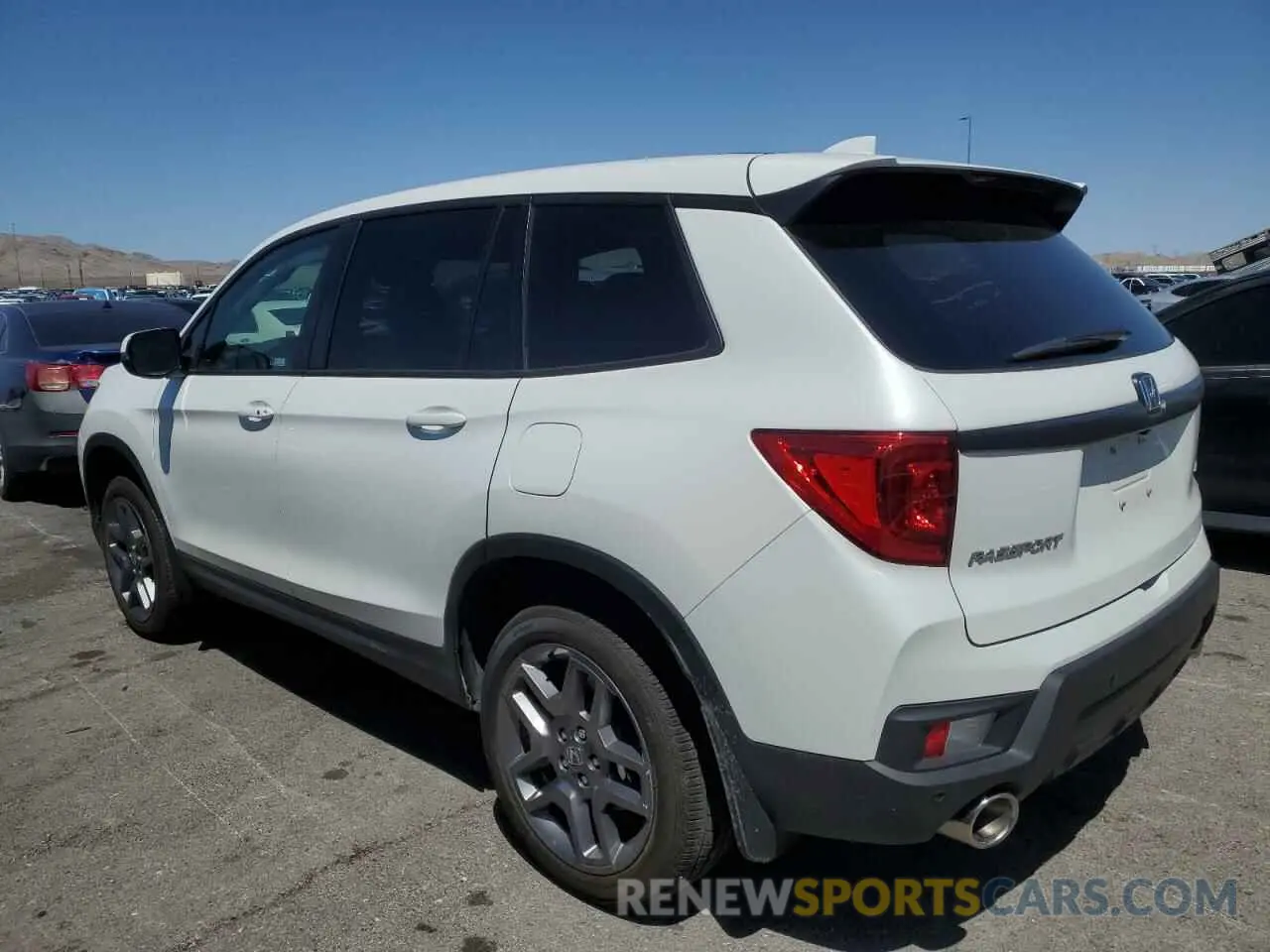 2 fotografías del automóvil dañado 5FNYF8H54PB029786 HONDA PASSPORT 2023