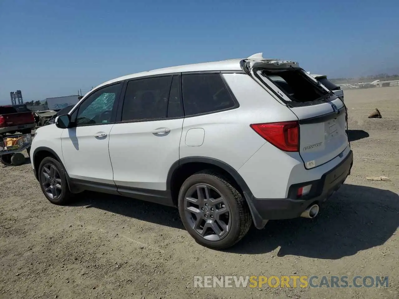 2 fotografías del automóvil dañado 5FNYF8H59PB010280 HONDA PASSPORT 2023