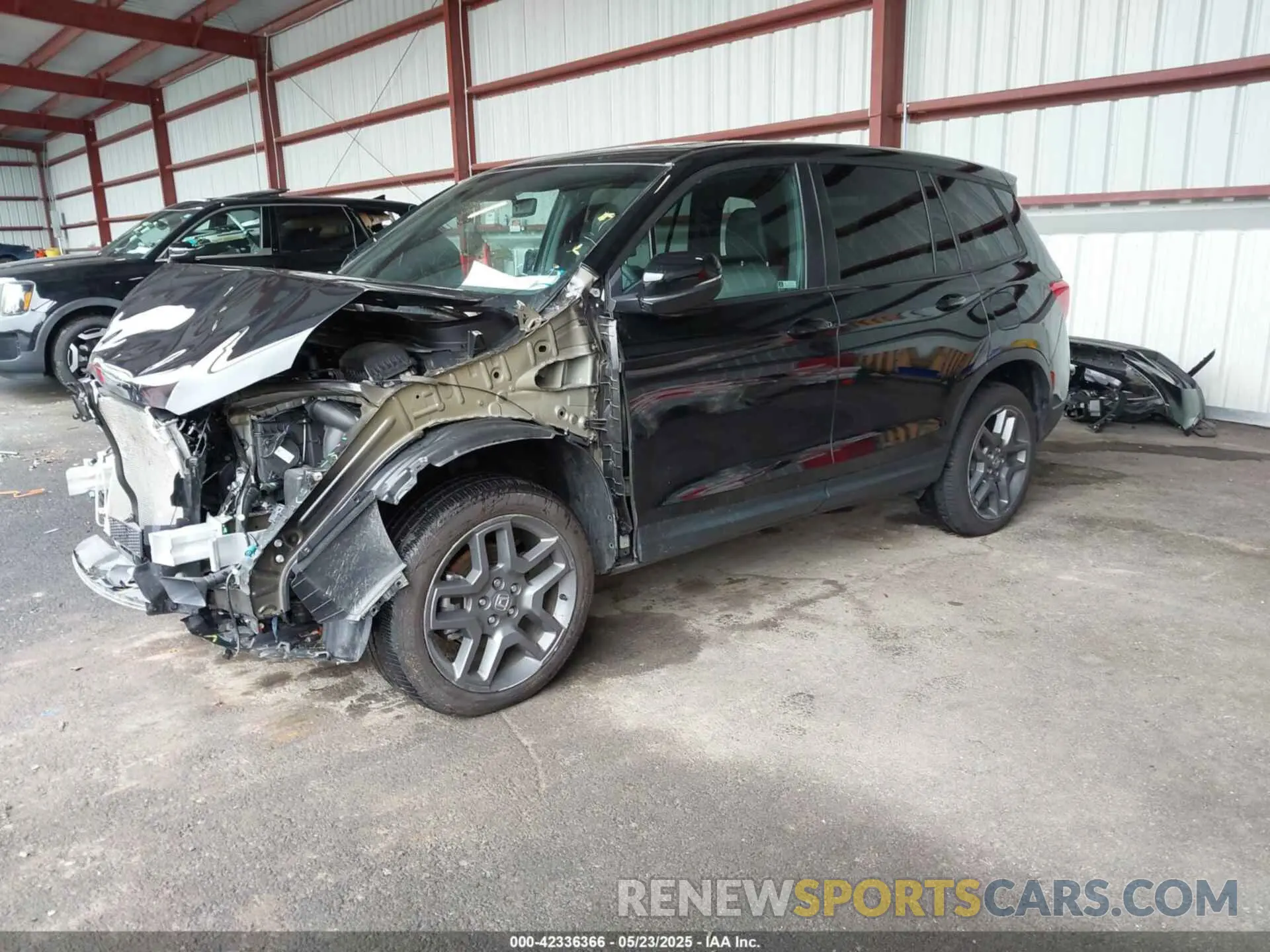 2 fotografías del automóvil dañado 5FNYF8H5XPB021370 HONDA PASSPORT 2023