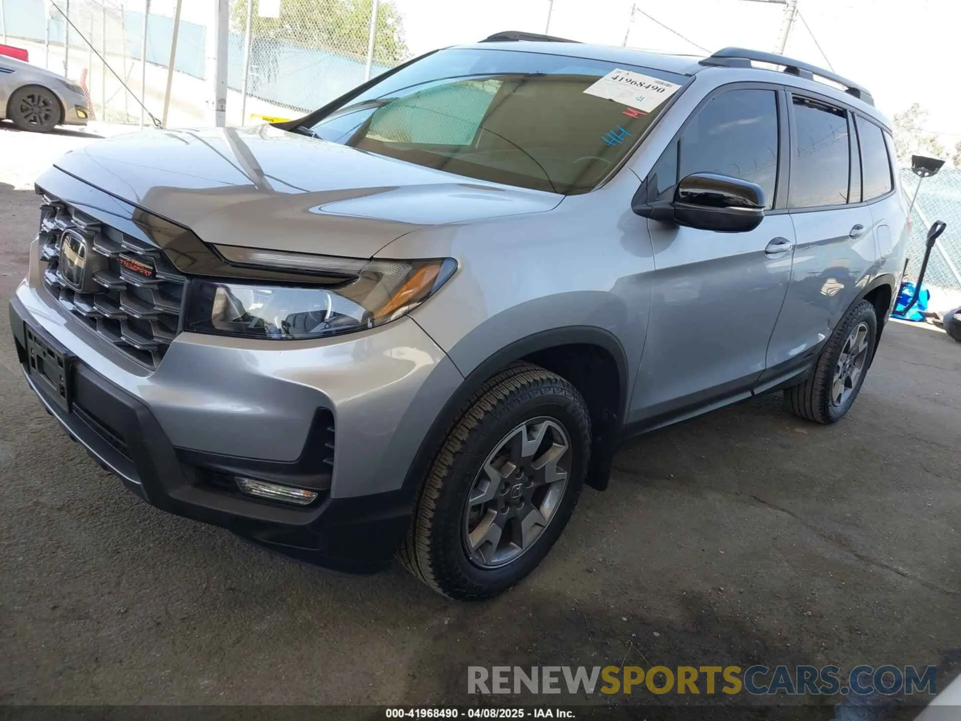 2 fotografías del automóvil dañado 5FNYF8H61PB028829 HONDA PASSPORT 2023