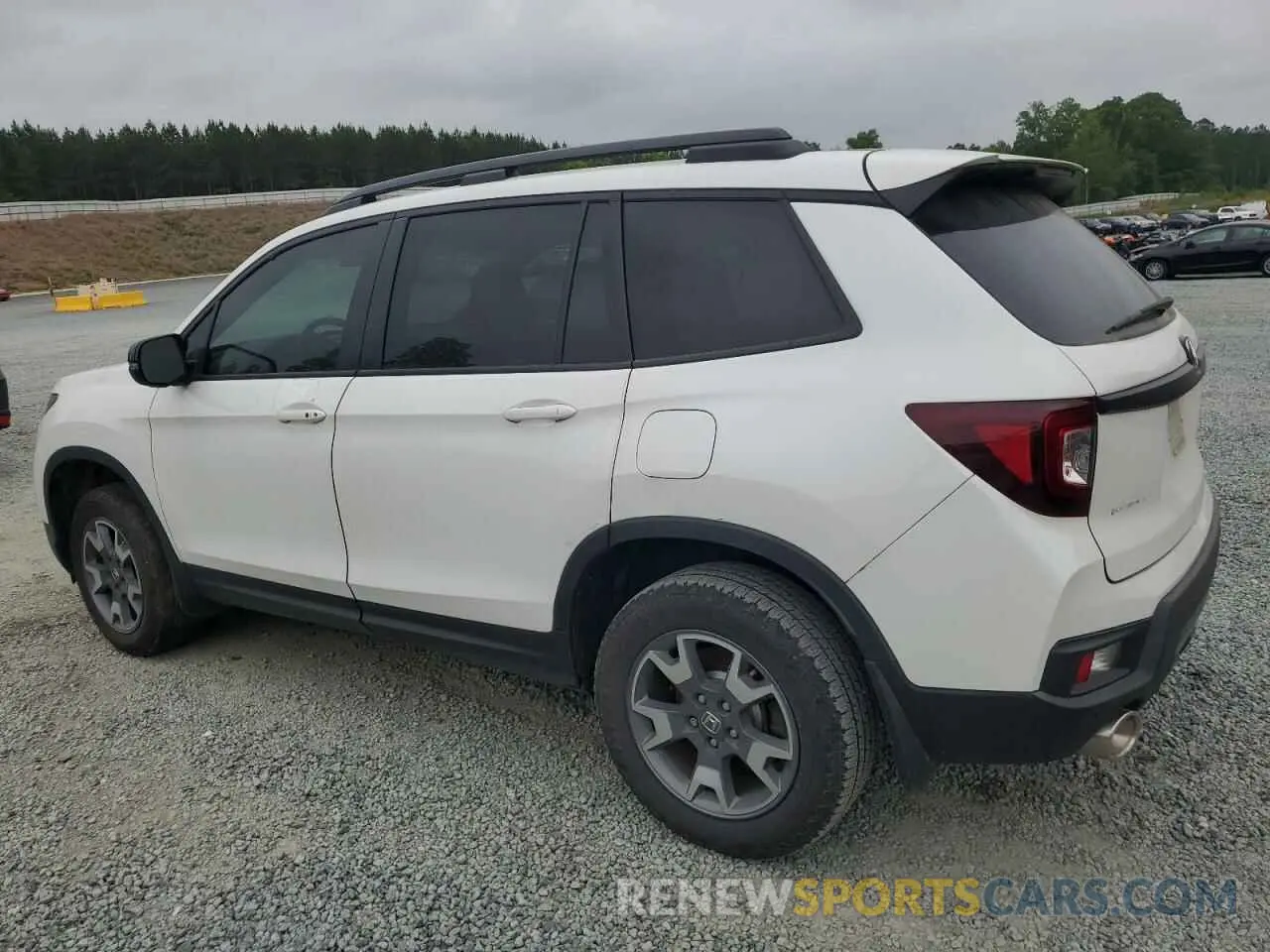 2 fotografías del automóvil dañado 5FNYF8H62PB003759 HONDA PASSPORT 2023