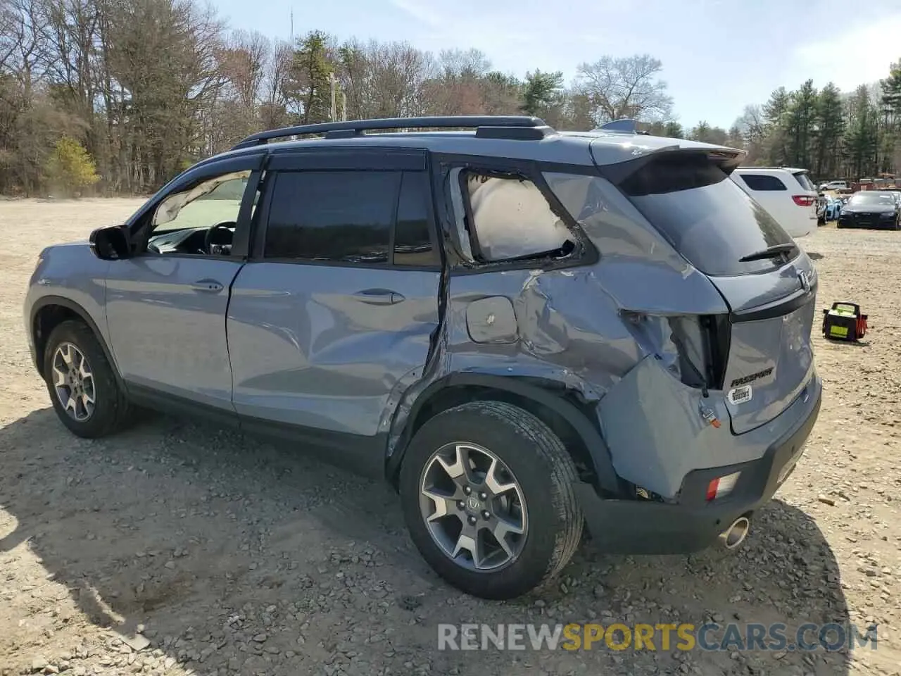 2 fotografías del automóvil dañado 5FNYF8H64PB032311 HONDA PASSPORT 2023