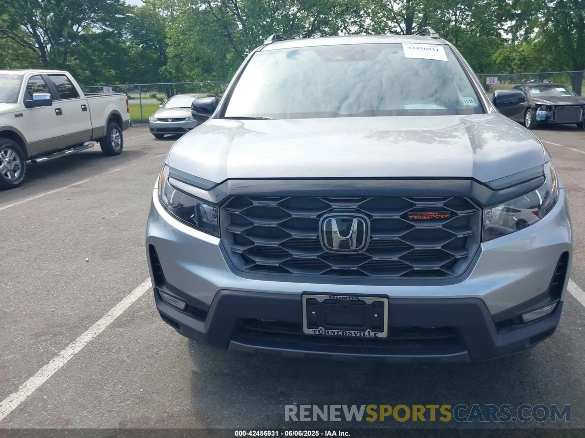 12 fotografías del automóvil dañado 5FNYF8H68PB043019 HONDA PASSPORT 2023