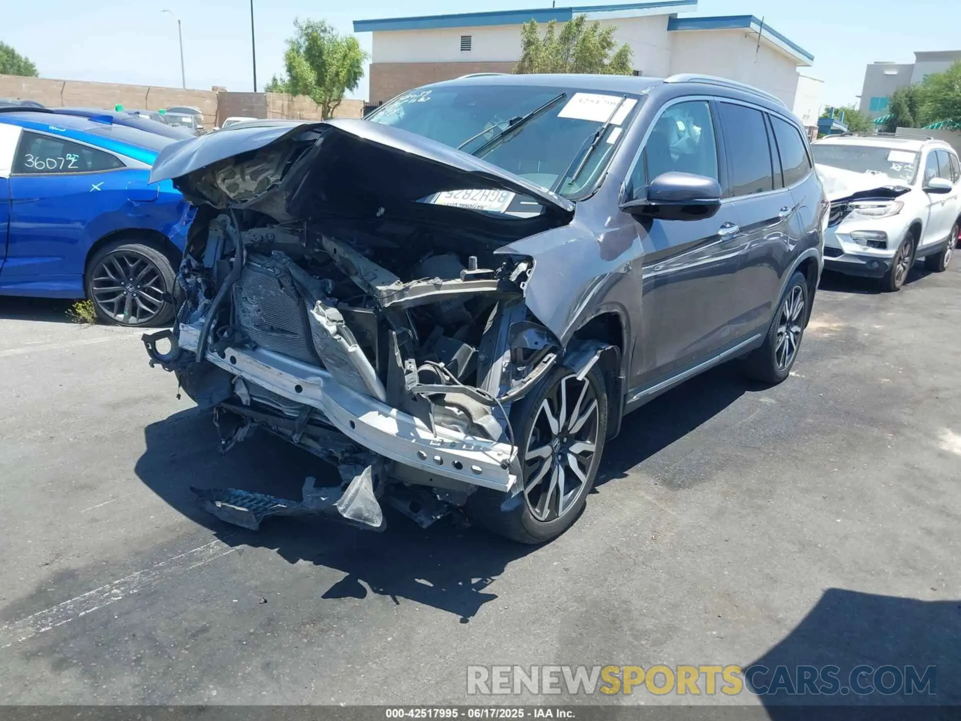 2 fotografías del automóvil dañado 5FNYF5H68KB002509 HONDA PILOT 2019
