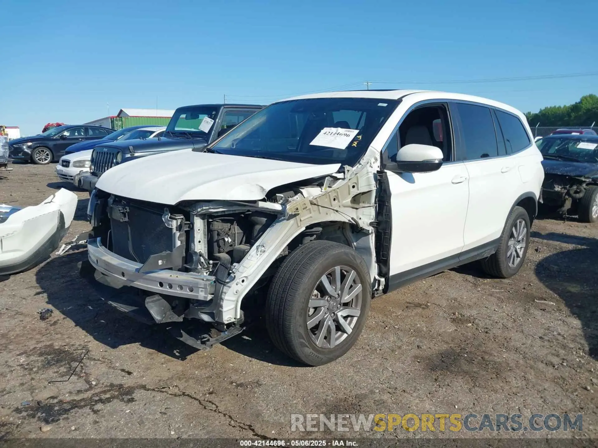 2 fotografías del automóvil dañado 5FNYF5H57LB008441 HONDA PILOT 2020