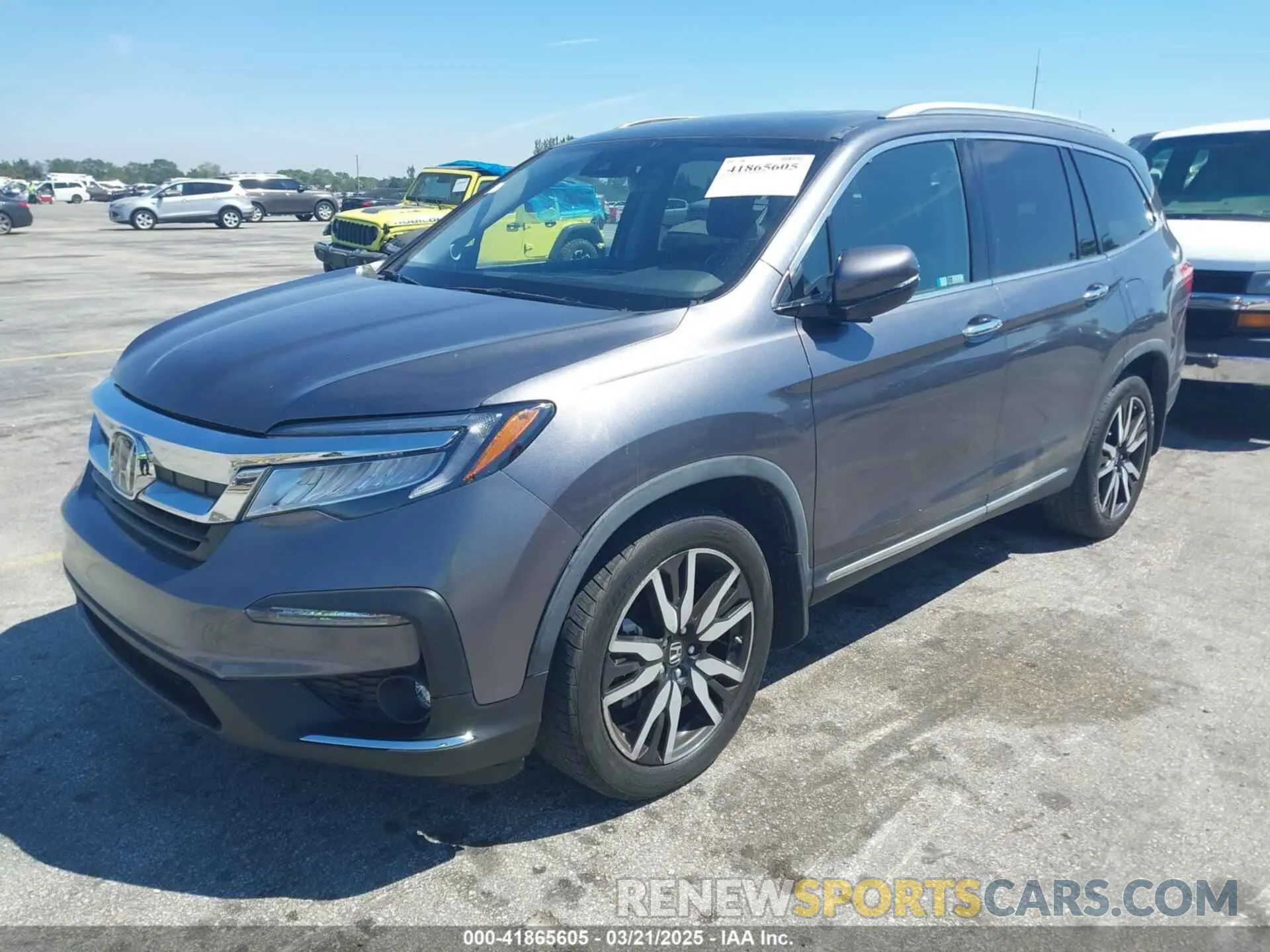 2 fotografías del automóvil dañado 5FNYF5H90LB000801 HONDA PILOT 2020