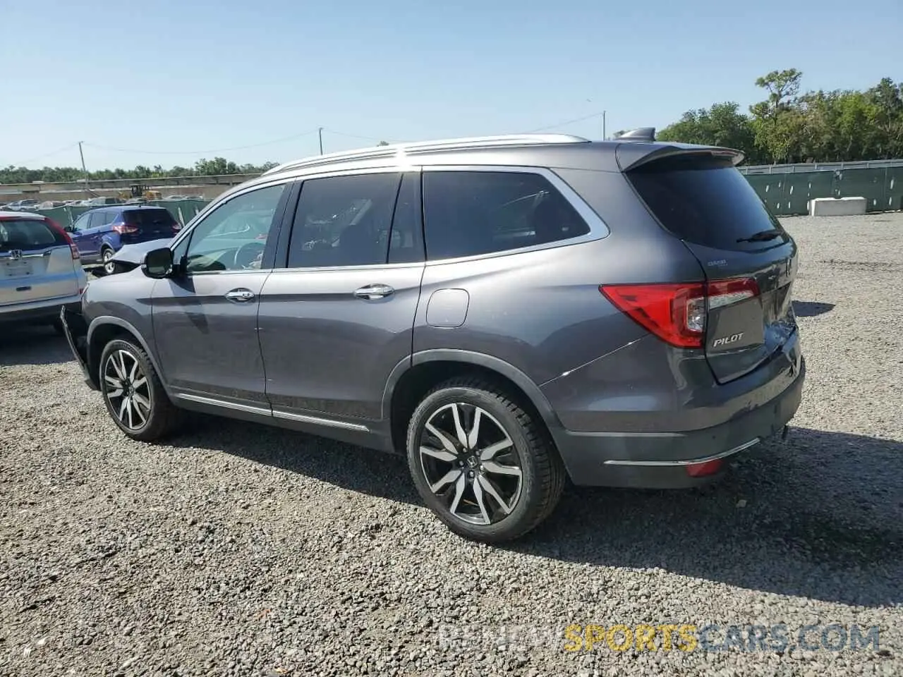 2 fotografías del automóvil dañado 5FNYF5H99LB000568 HONDA PILOT 2020