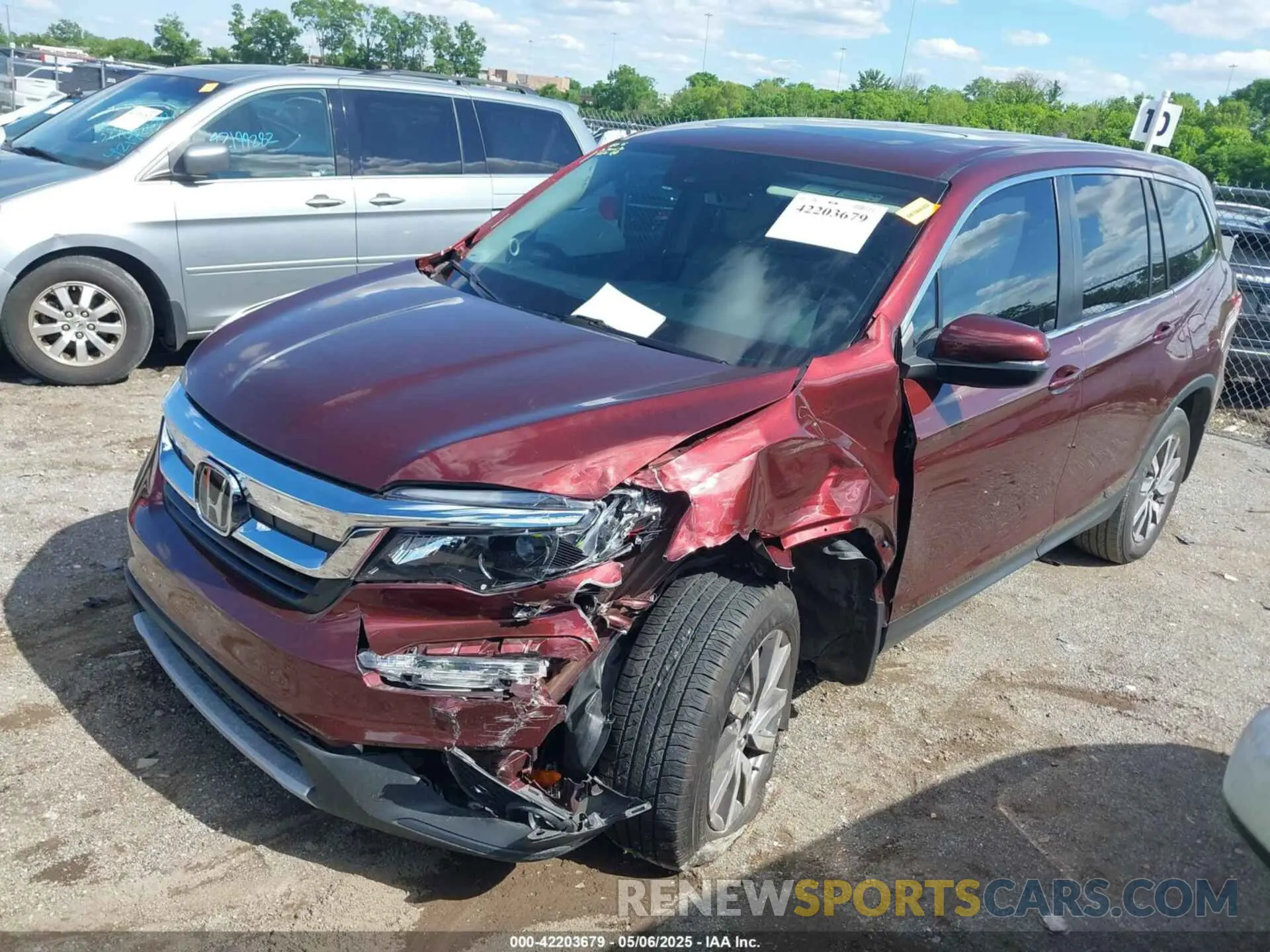 2 fotografías del automóvil dañado 5FNYF5H5XMB042472 HONDA PILOT 2021