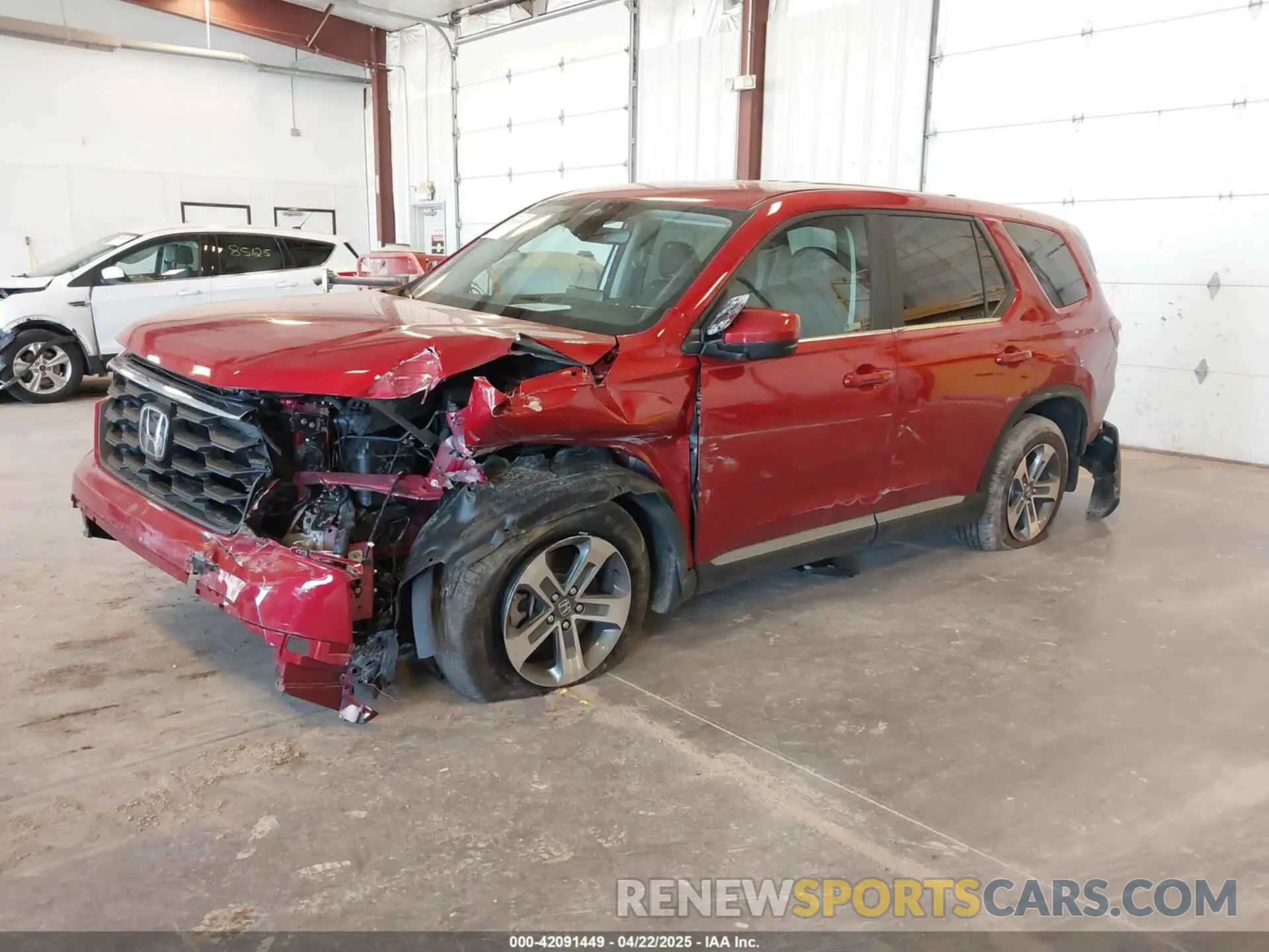 2 fotografías del automóvil dañado 5FNYG1H50PB019244 HONDA PILOT 2023
