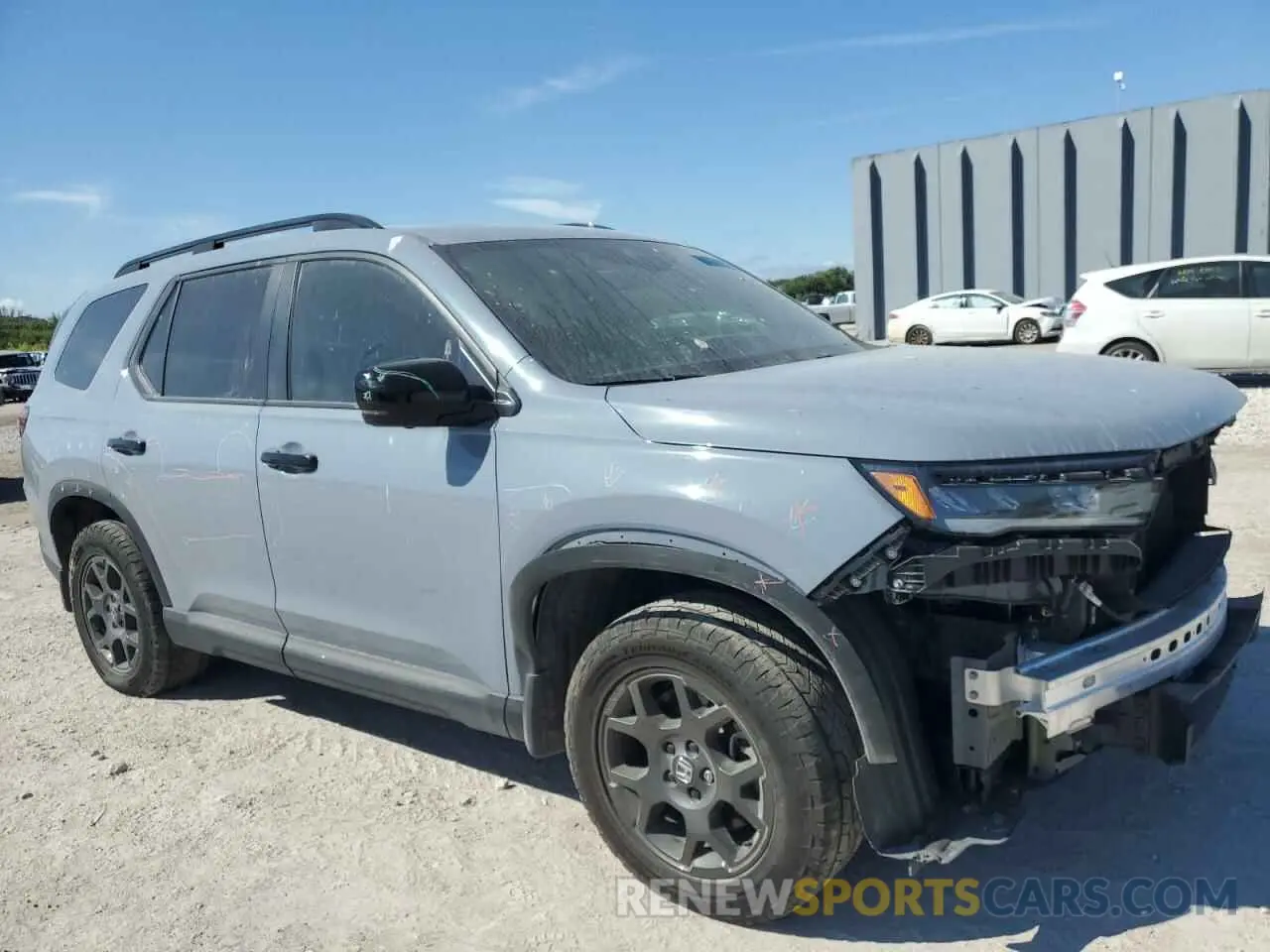 4 fotografías del automóvil dañado 5FNYG1H63PB057270 HONDA PILOT 2023