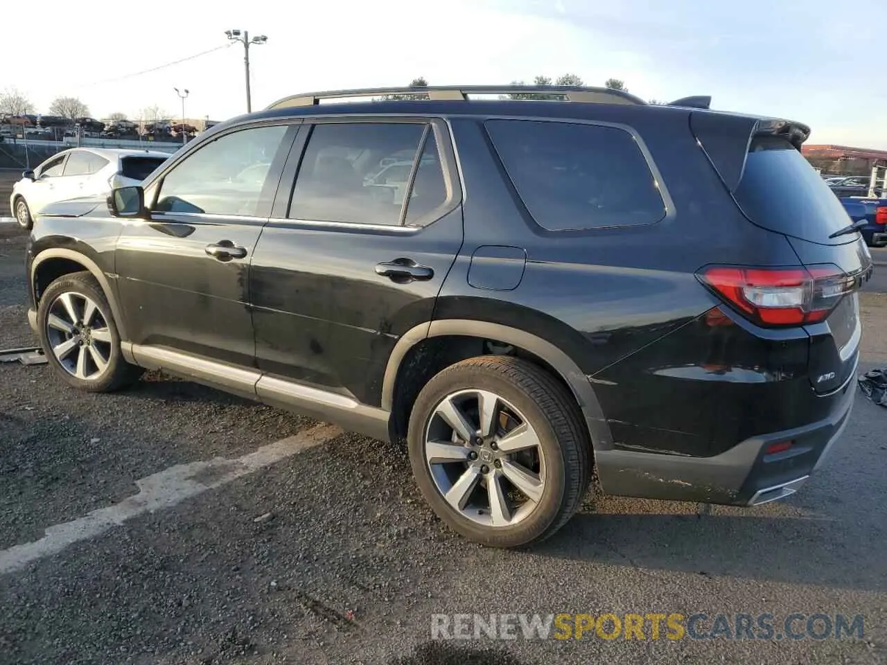 2 fotografías del automóvil dañado 5FNYG1H76PB023316 HONDA PILOT 2023