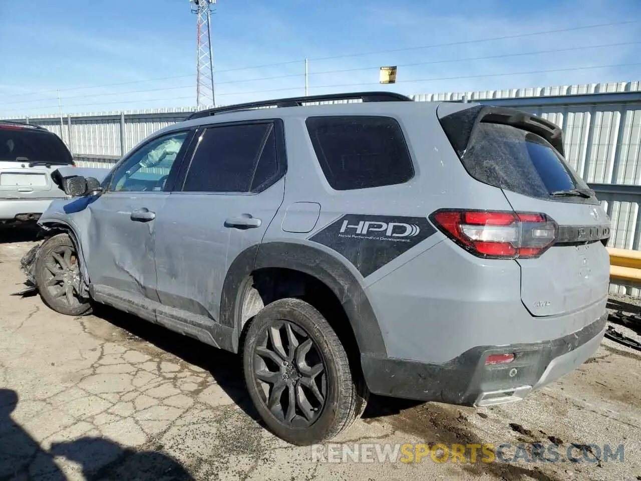 2 fotografías del automóvil dañado 5FNYG1H89PB025683 HONDA PILOT 2023