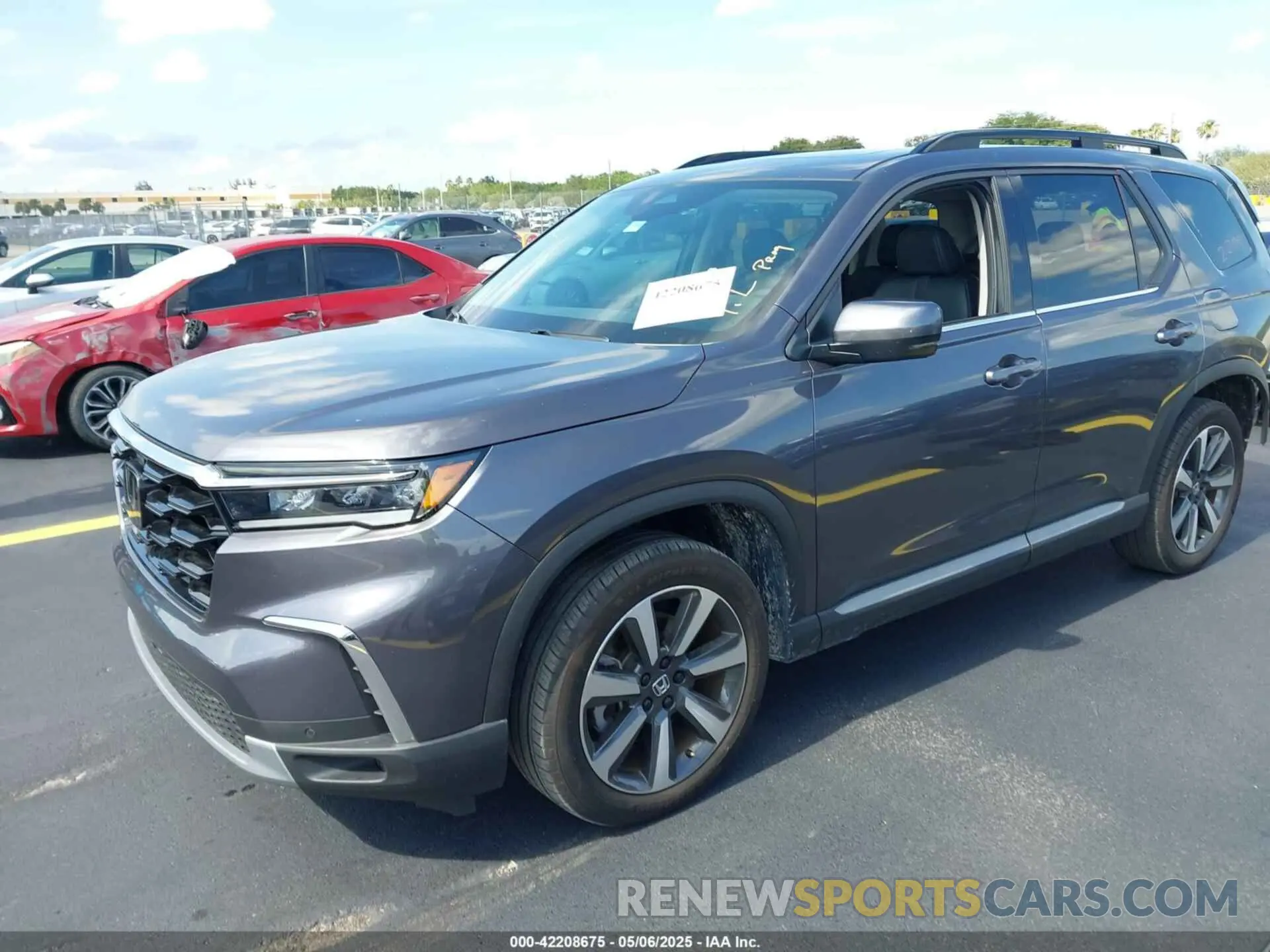 2 fotografías del automóvil dañado 5FNYG2H71PB012374 HONDA PILOT 2023