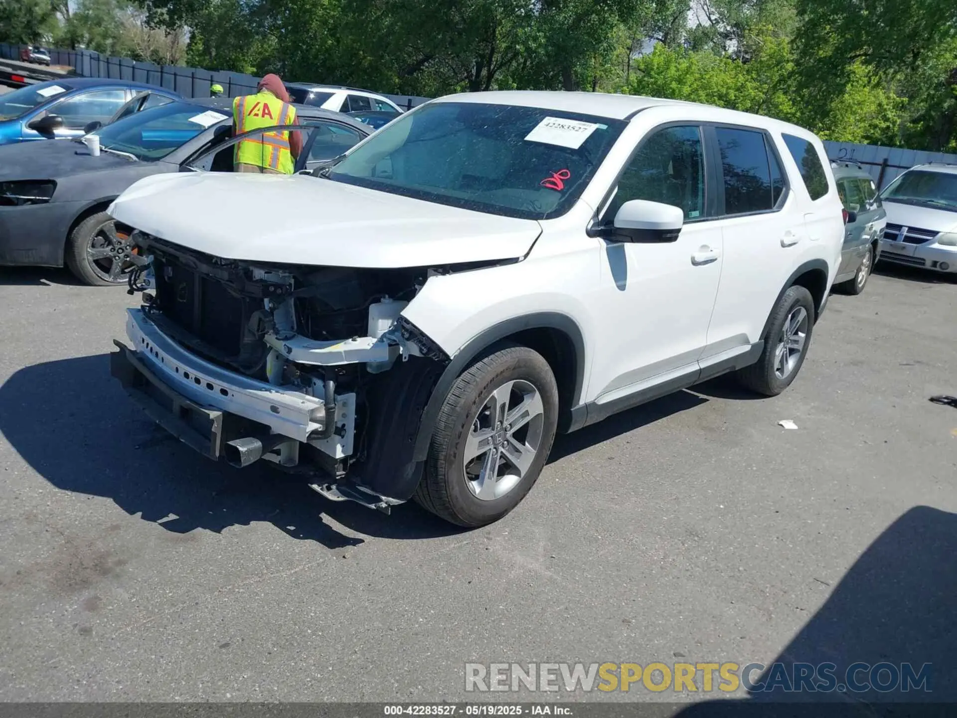2 fotografías del automóvil dañado 5FNYG1H46RB014463 HONDA PILOT 2024
