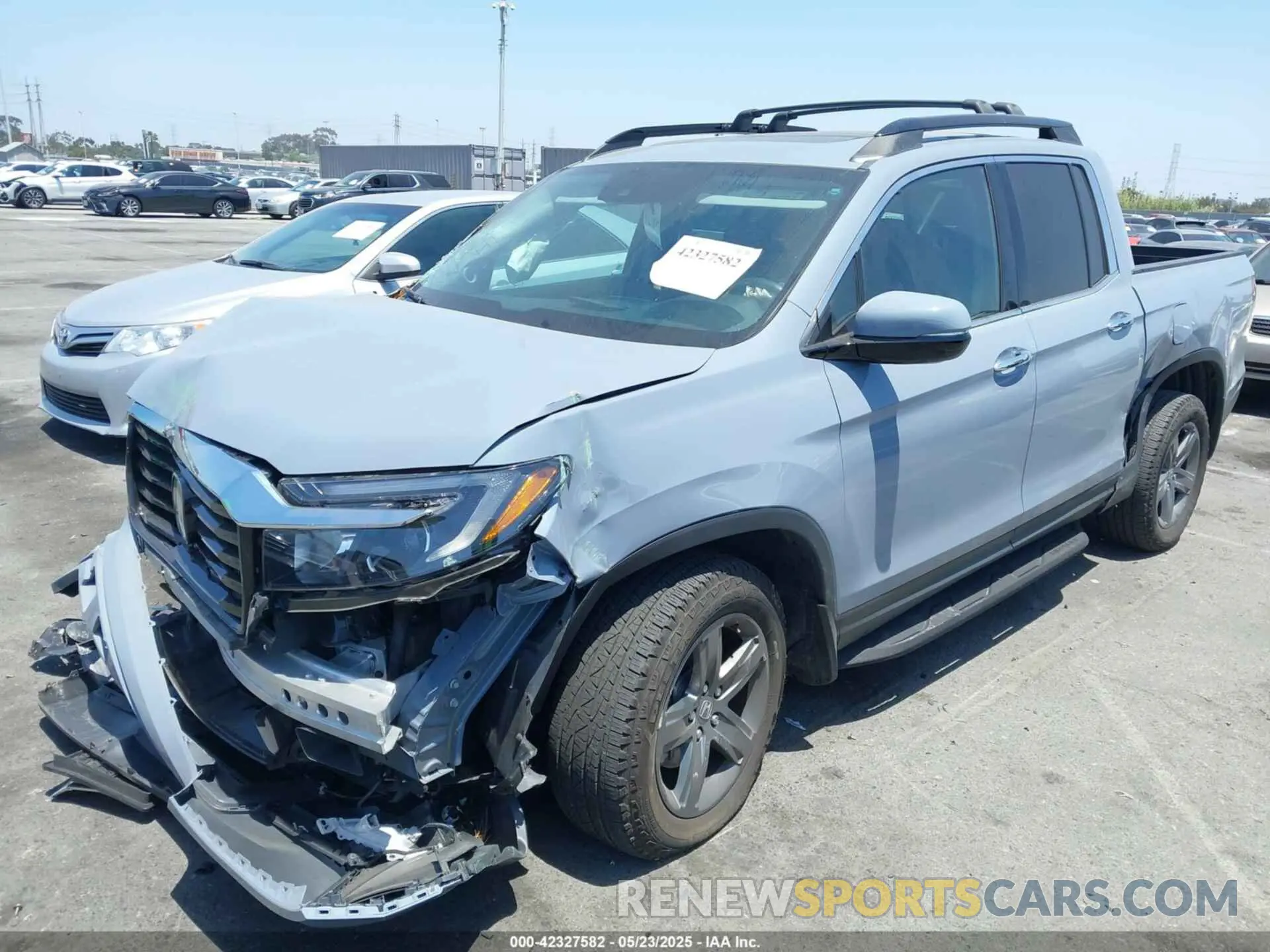 2 fotografías del automóvil dañado 5FPYK3F76NB019199 HONDA RIDGELINE 2022
