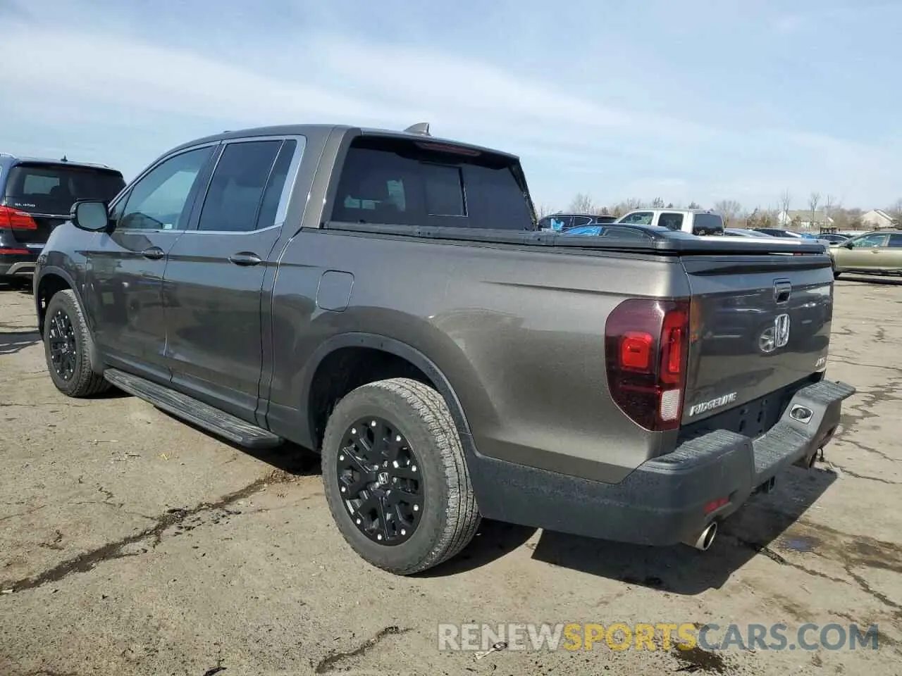 2 fotografías del automóvil dañado 5FPYK3F5XPB021281 HONDA RIDGELINE 2023