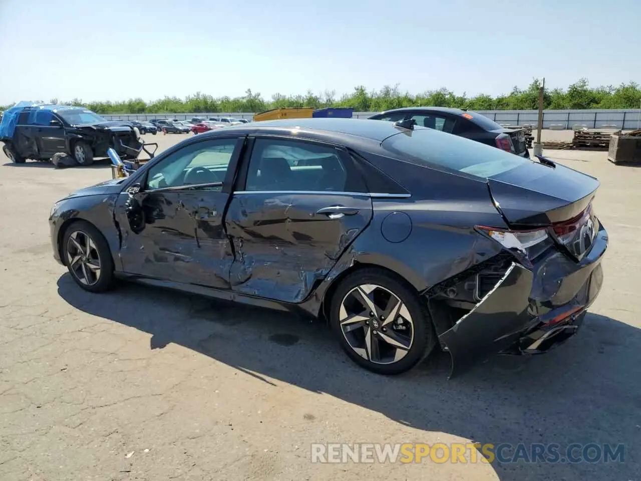 2 fotografías del automóvil dañado 5NPLN4AG9NH067871 HYUNDAI ELANTRA 2022
