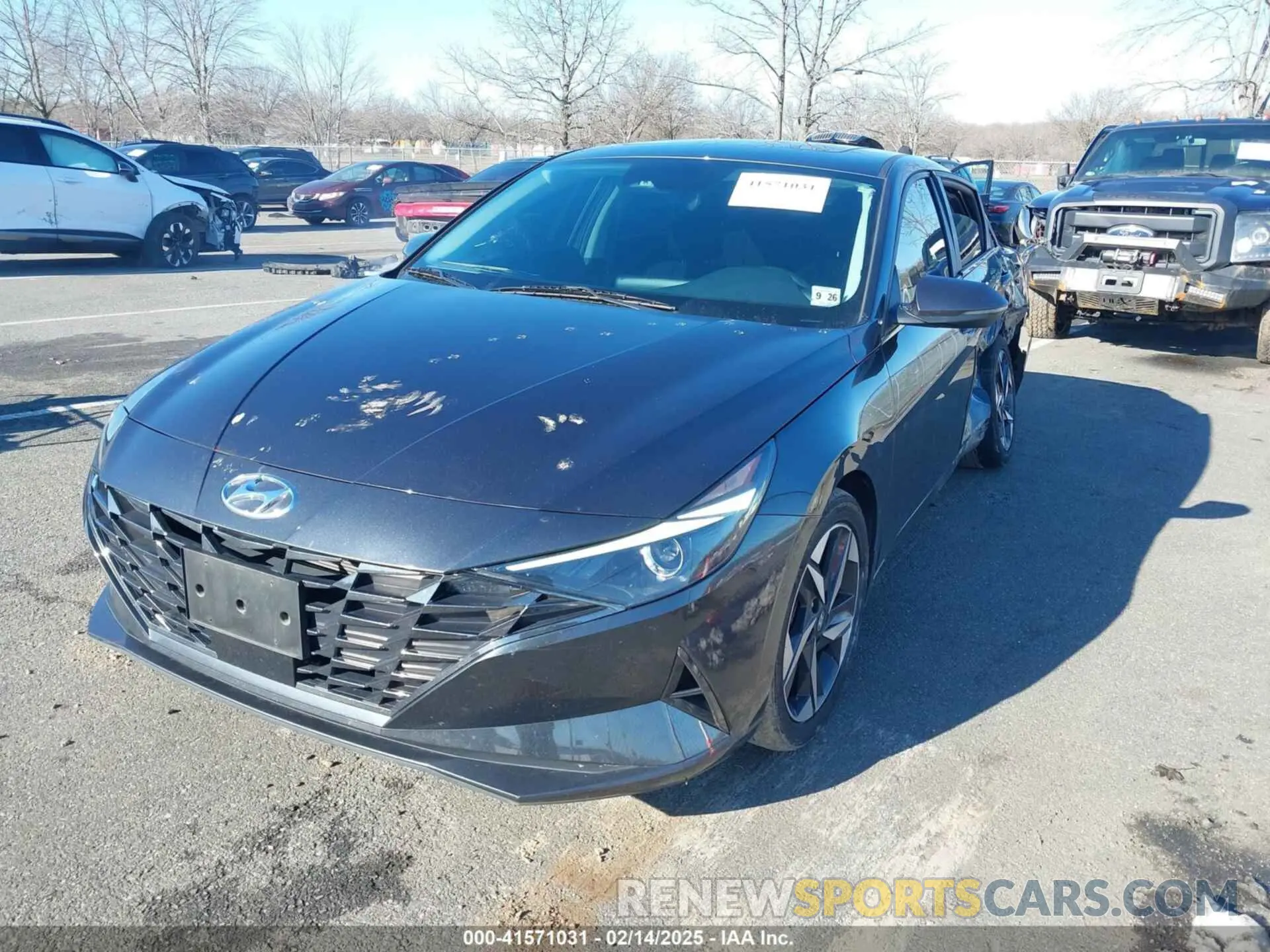 2 fotografías del automóvil dañado 5NPLN4AGXNH057009 HYUNDAI ELANTRA 2022