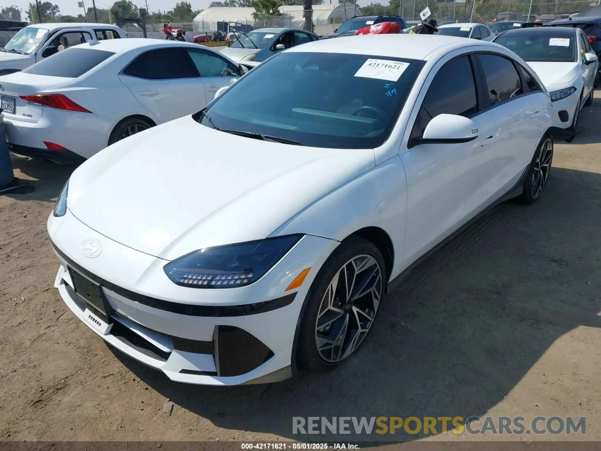 2 fotografías del automóvil dañado KMHM34AA0PA028579 HYUNDAI IONIQ 6 2023