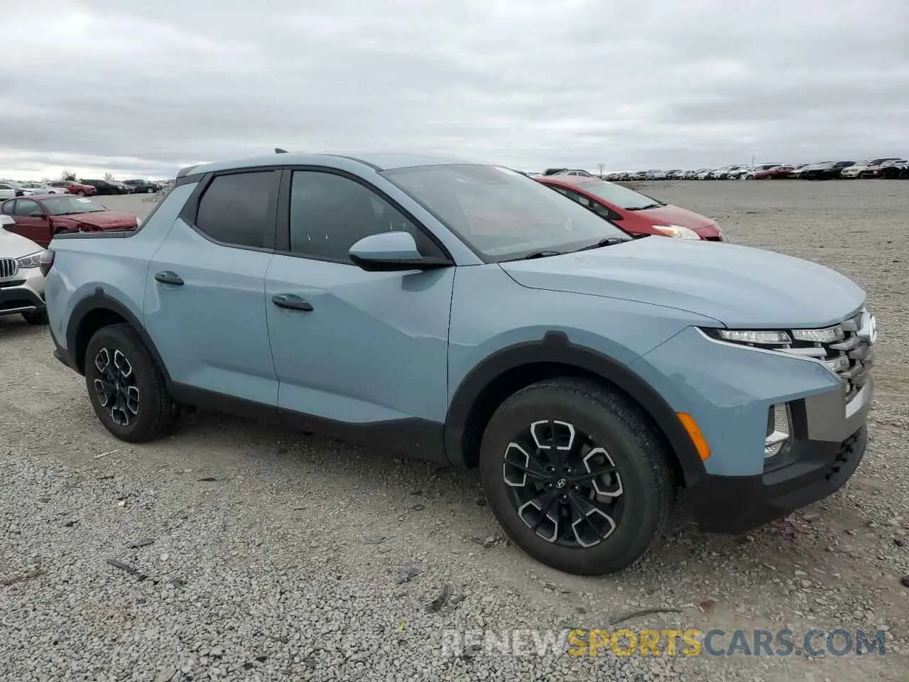 4 fotografías del automóvil dañado 5NTJADAE1NH025763 HYUNDAI SANTA CRUZ 2022