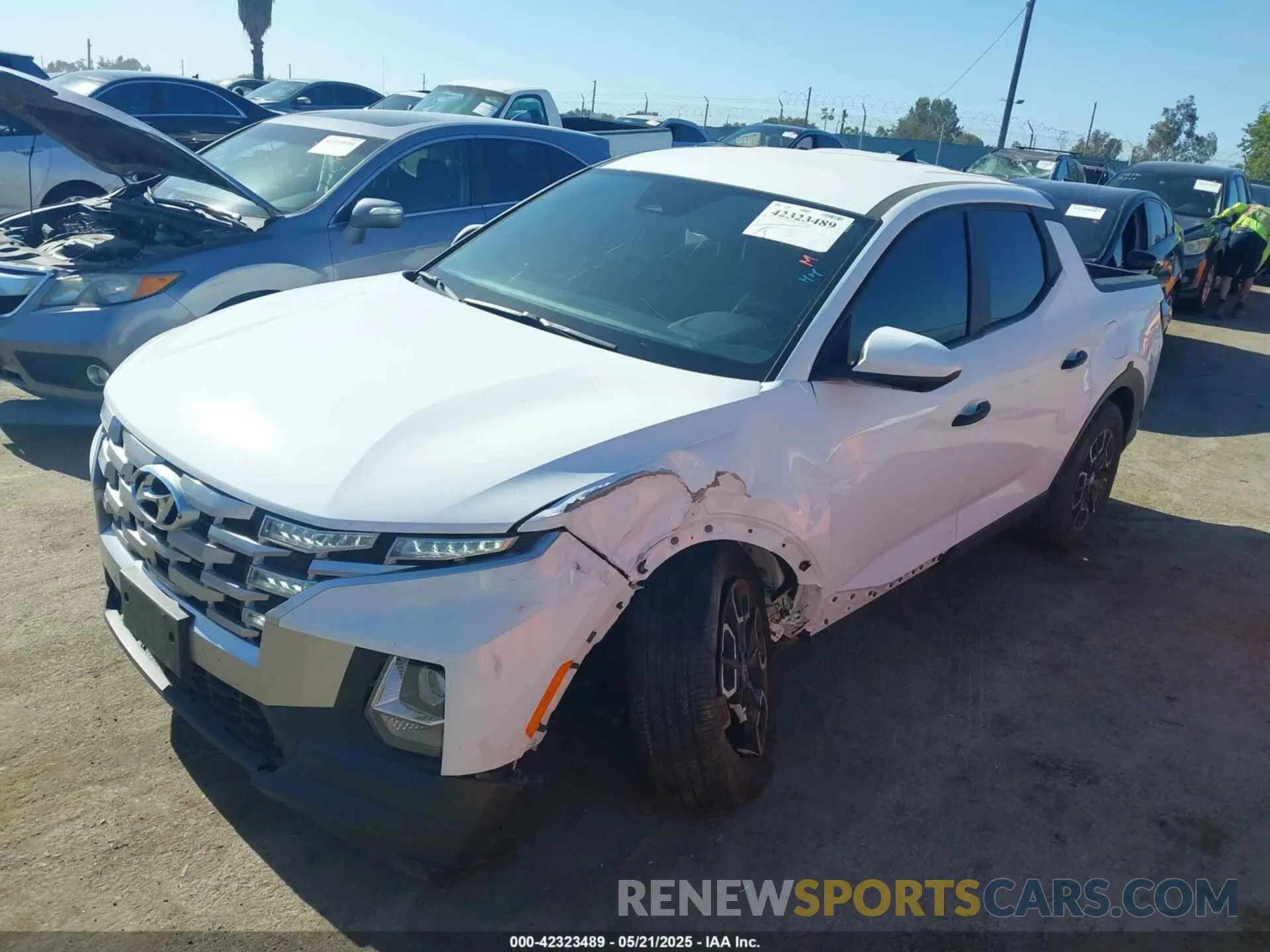 2 fotografías del automóvil dañado 5NTJADAEXNH023610 HYUNDAI SANTA CRUZ 2022