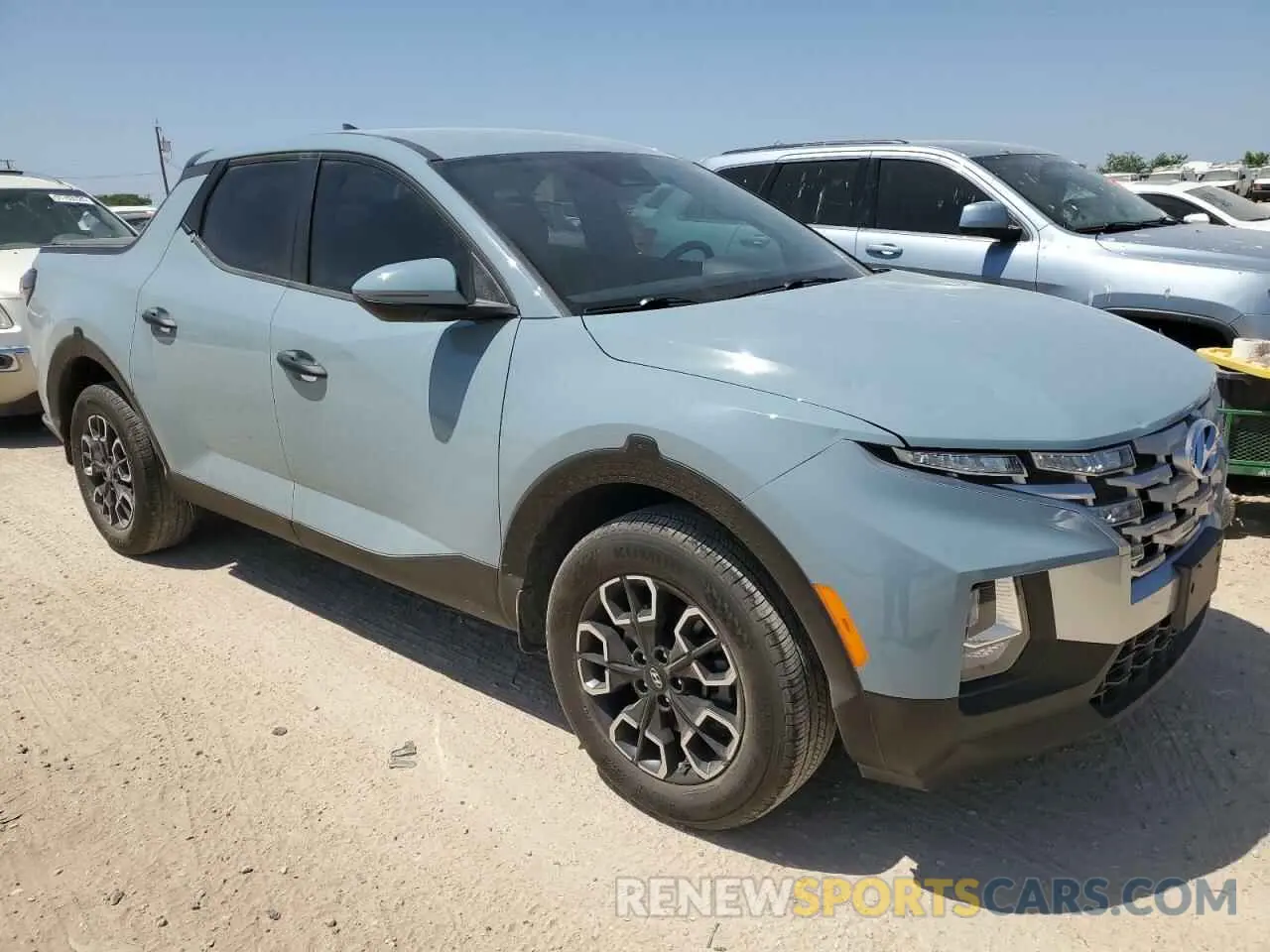 4 fotografías del automóvil dañado 5NTJB4AE1NH010080 HYUNDAI SANTA CRUZ 2022