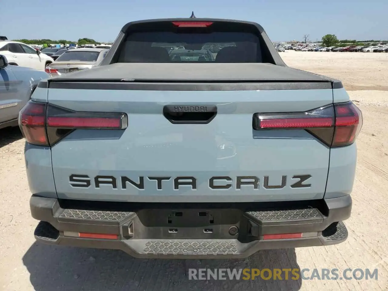 6 fotografías del automóvil dañado 5NTJB4AE1NH010080 HYUNDAI SANTA CRUZ 2022
