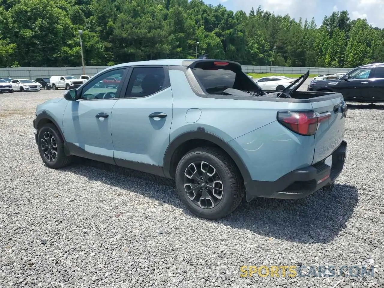 2 fotografías del automóvil dañado 5NTJB4AEXNH018789 HYUNDAI SANTA CRUZ 2022