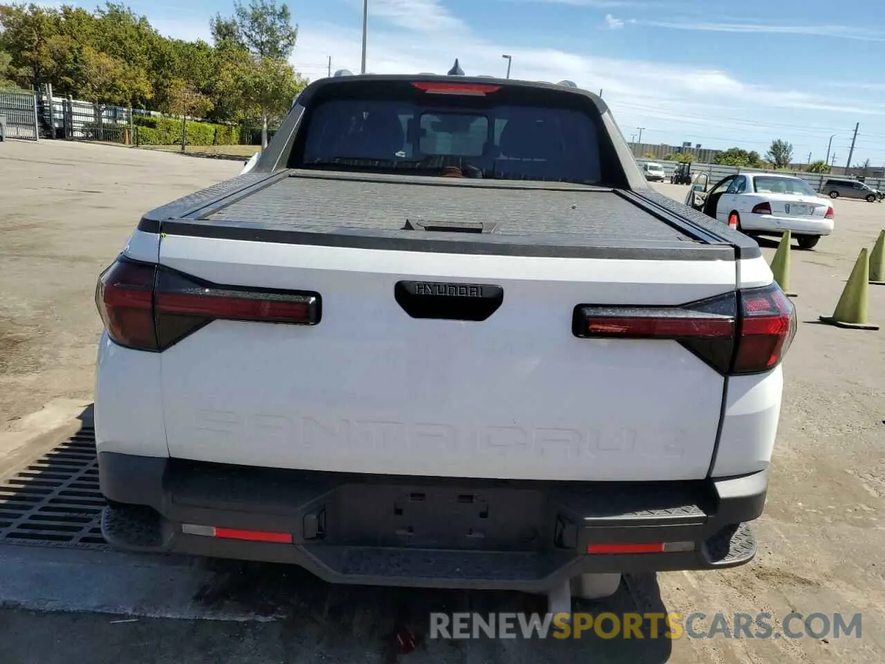 6 fotografías del automóvil dañado 5NTJC4AE0NH019320 HYUNDAI SANTA CRUZ 2022
