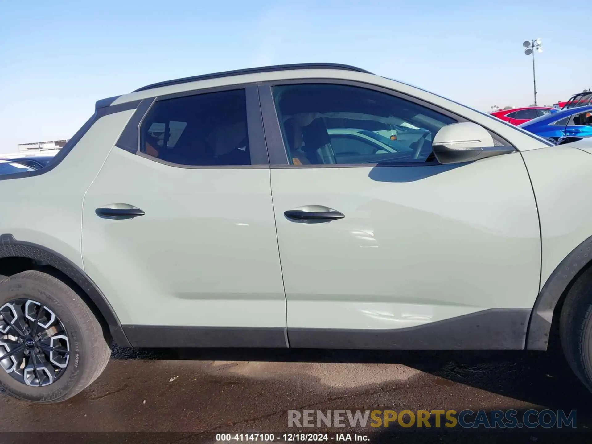 13 fotografías del automóvil dañado 5NTJC4AE4NH017876 HYUNDAI SANTA CRUZ 2022