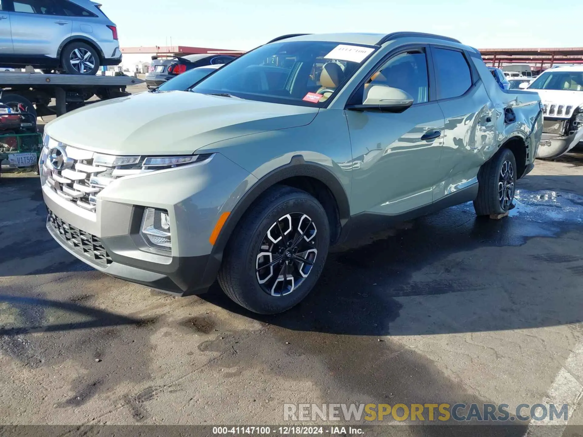 2 fotografías del automóvil dañado 5NTJC4AE4NH017876 HYUNDAI SANTA CRUZ 2022