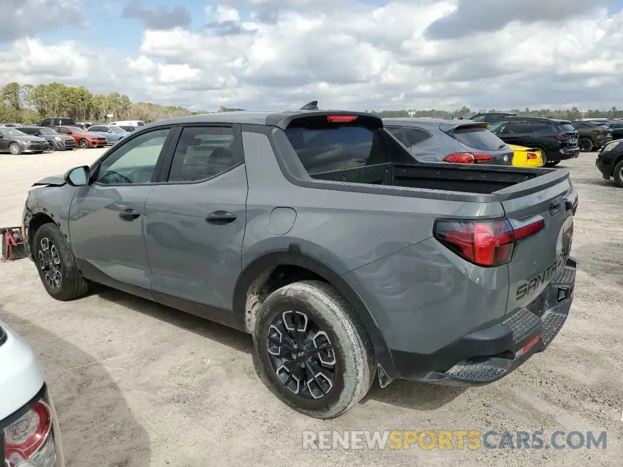 2 fotografías del automóvil dañado 5NTJB4AE5PH040718 HYUNDAI SANTA CRUZ 2023
